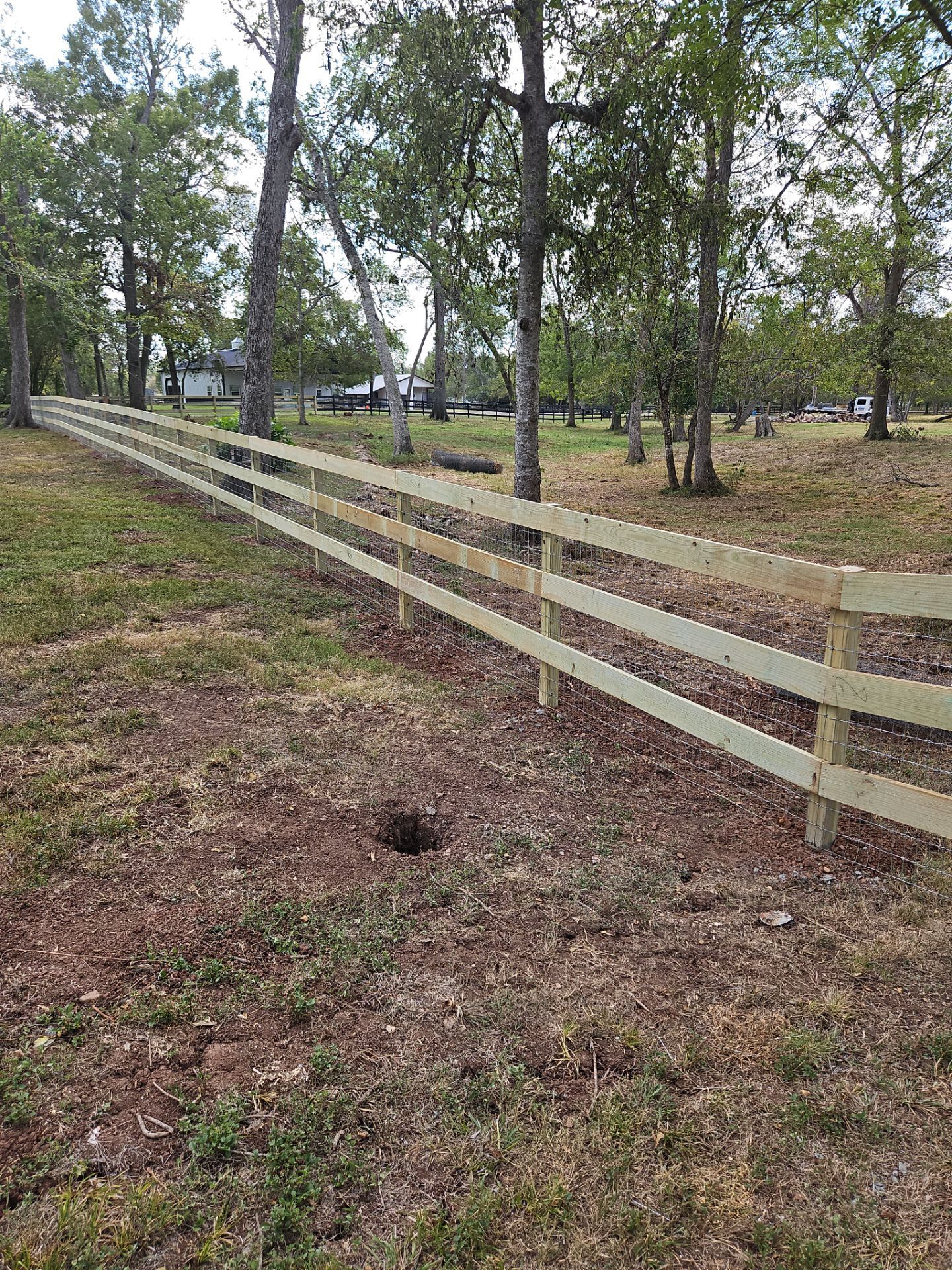 Ranch Style fence Plus Iron installation by Tim's Fences