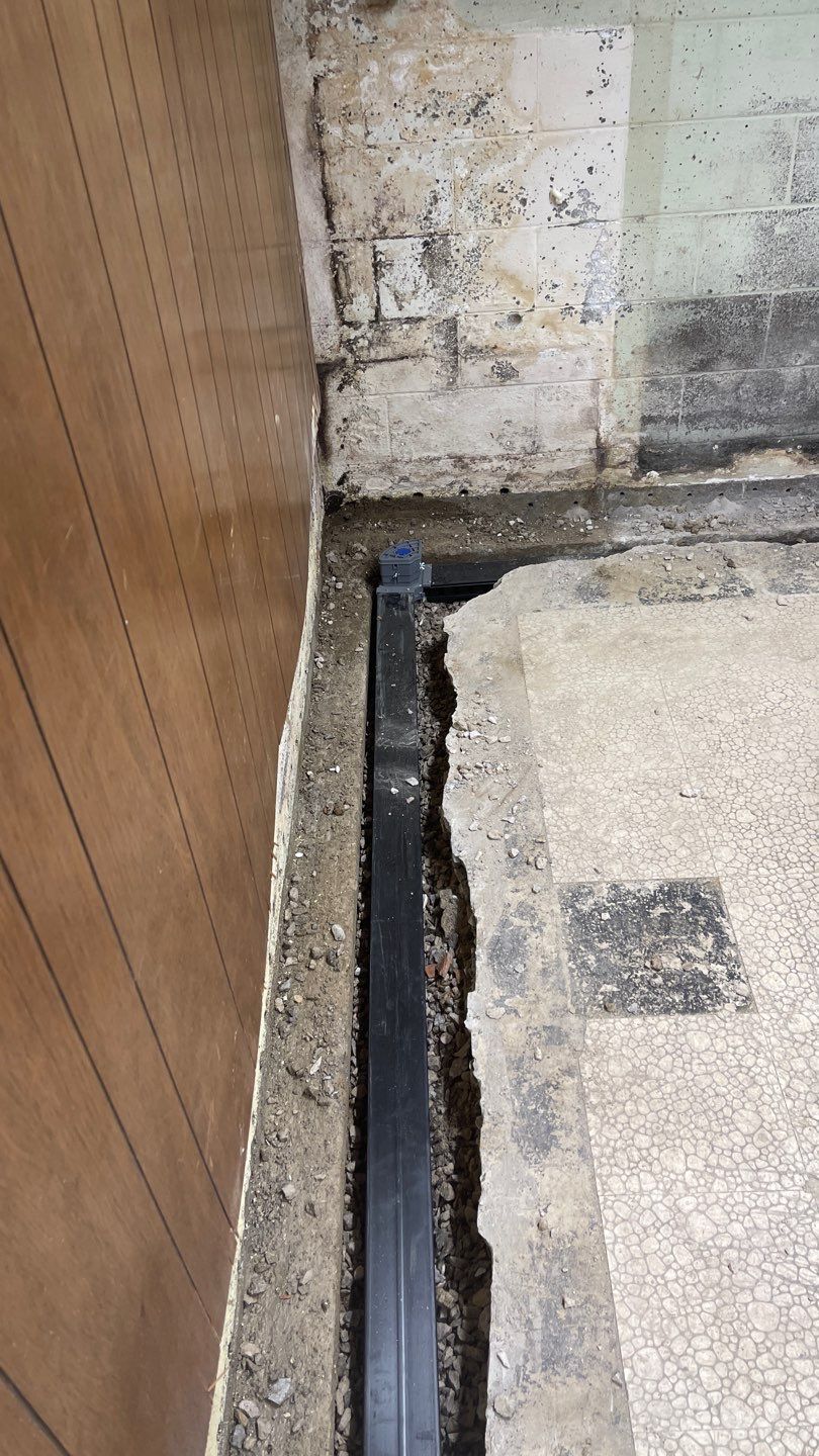 Interior Waterproofing Using GrateDrain™ Products by Toledo Basement Repair