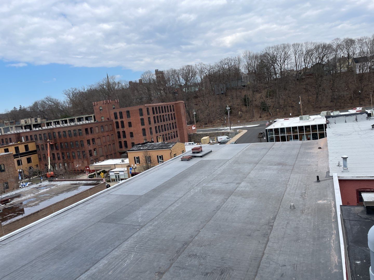 Commercial Roofing Installation using EPDM  by A Plus Exterior