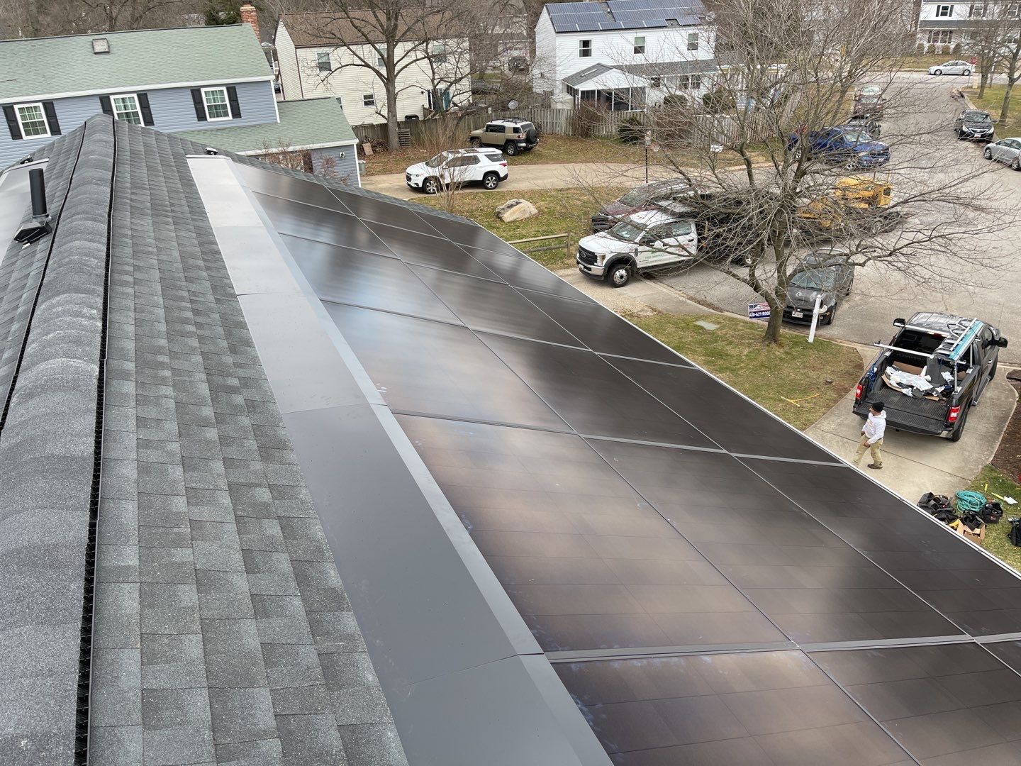 Roof Replacement with GAF Decotech integrated solar panels by American Home Contractors