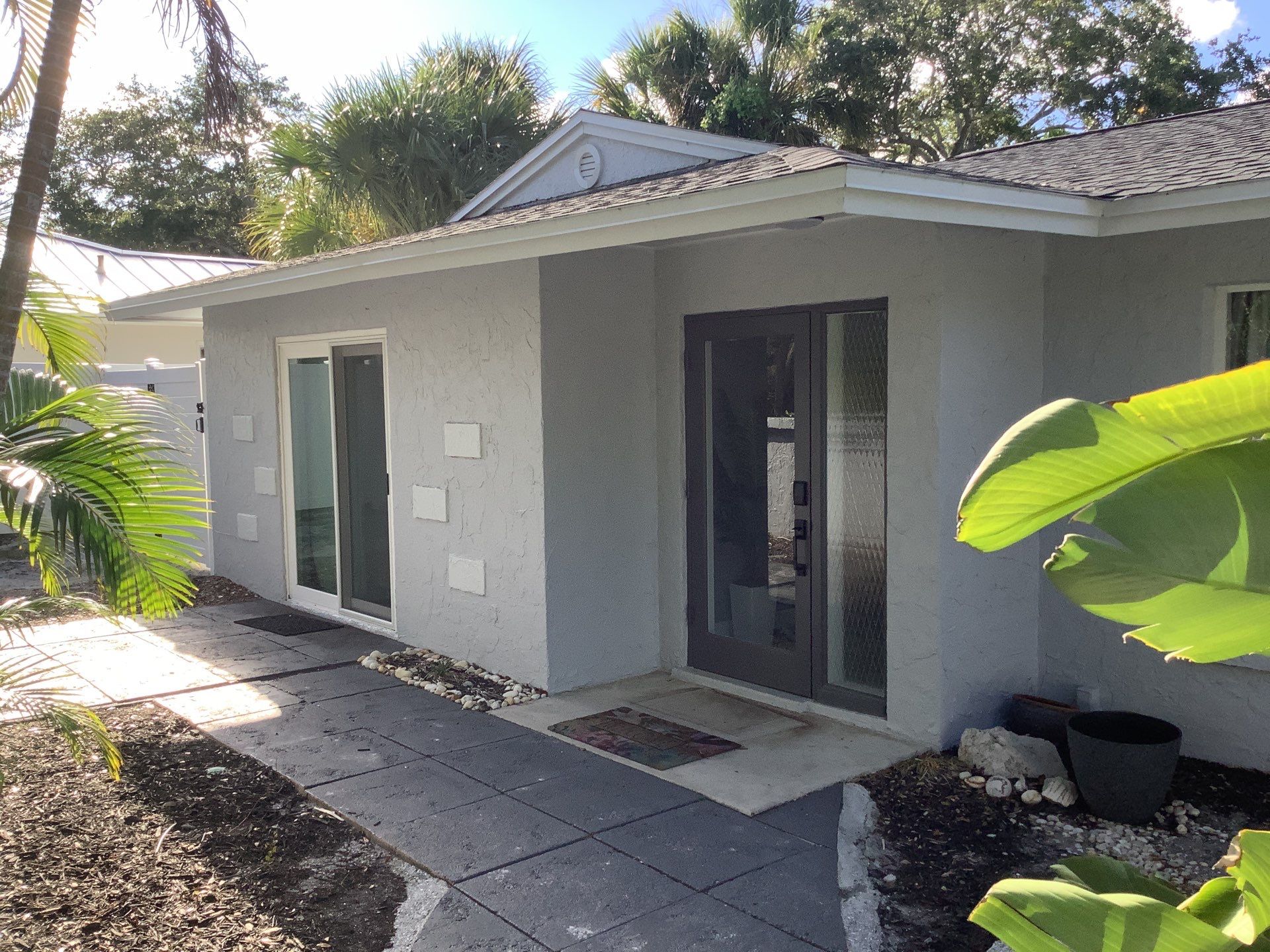 Black Seamless Gutters Installation in Siesta Key FL by Gutter Professors