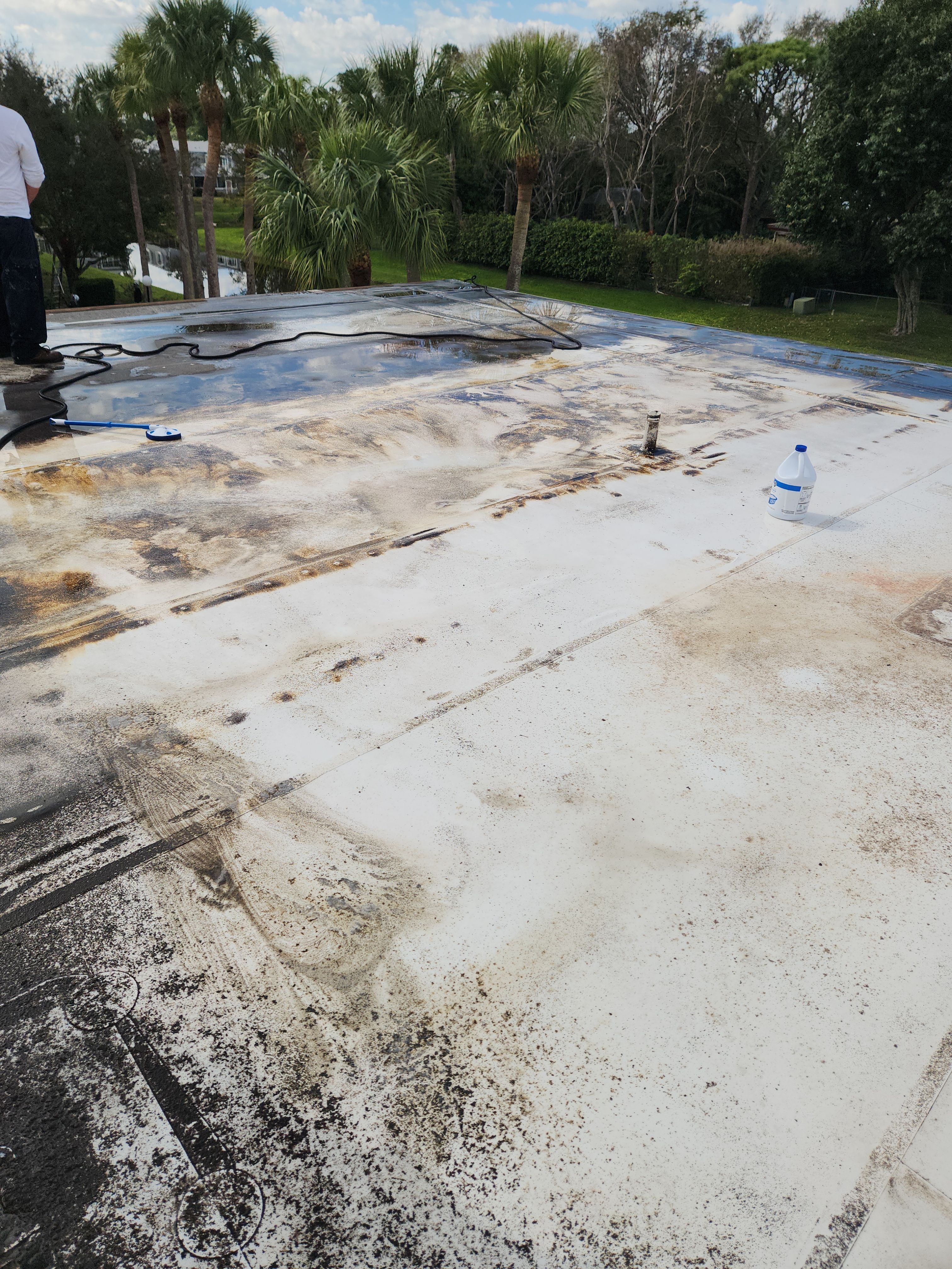 Reflective Silicone Roof Coating and Maintenance in Palm Beach Gardens by Aastro Roofing