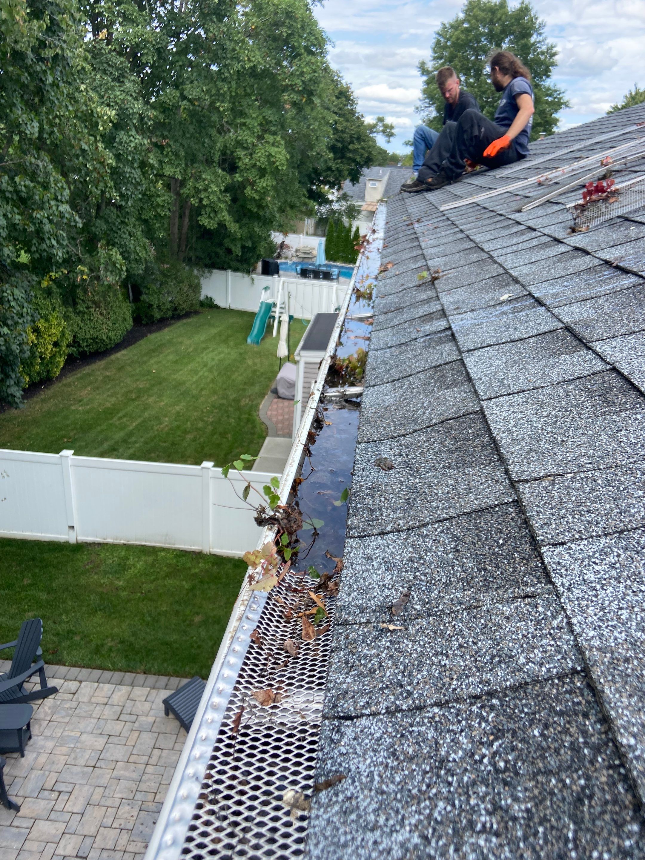 Gutter Cleaning with Screening by Above All Gutters 
