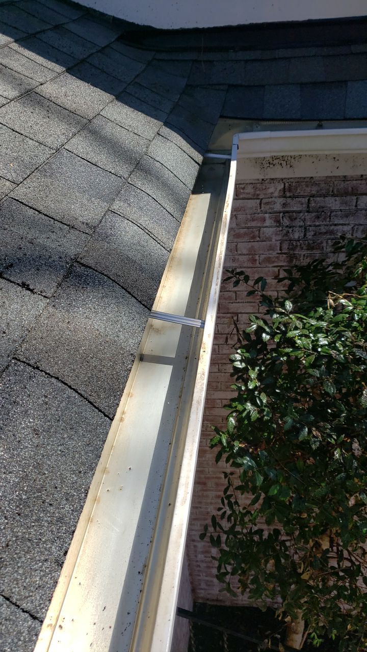 Gutter Cleaning using water by Power Wash Masters LLC