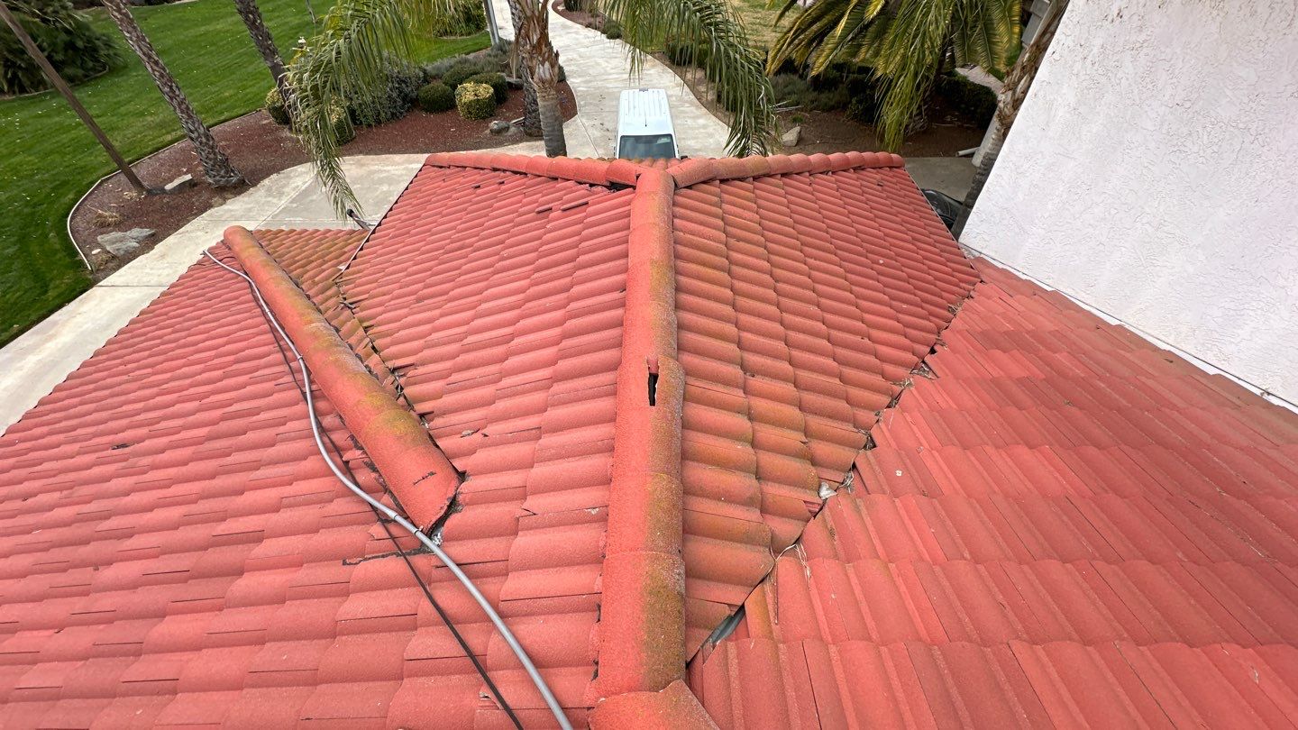 Tile refurbish project using existing tiles and replaced underlayment and battens by Straight Edge Roofing Inc