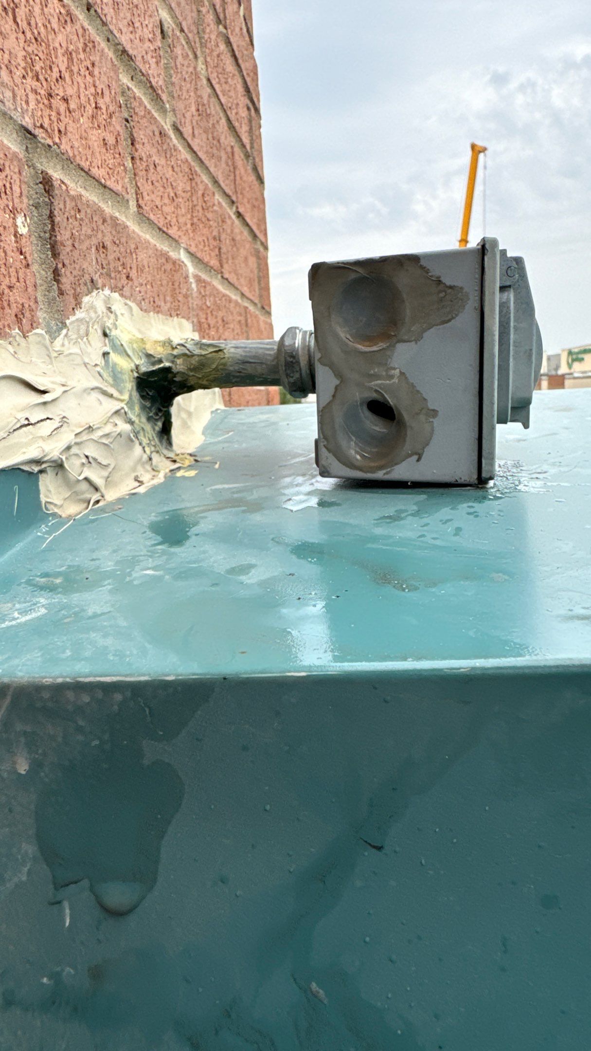 Commercial Roofing Repair using TRP #924 Eterna-Sil Premium Silicone Roof Coating by Harvey Roofing & Construction