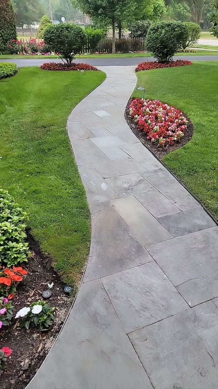 Northbrook, IL stucco home soft wash and stone cleaning by Northern Power Washing LLC.