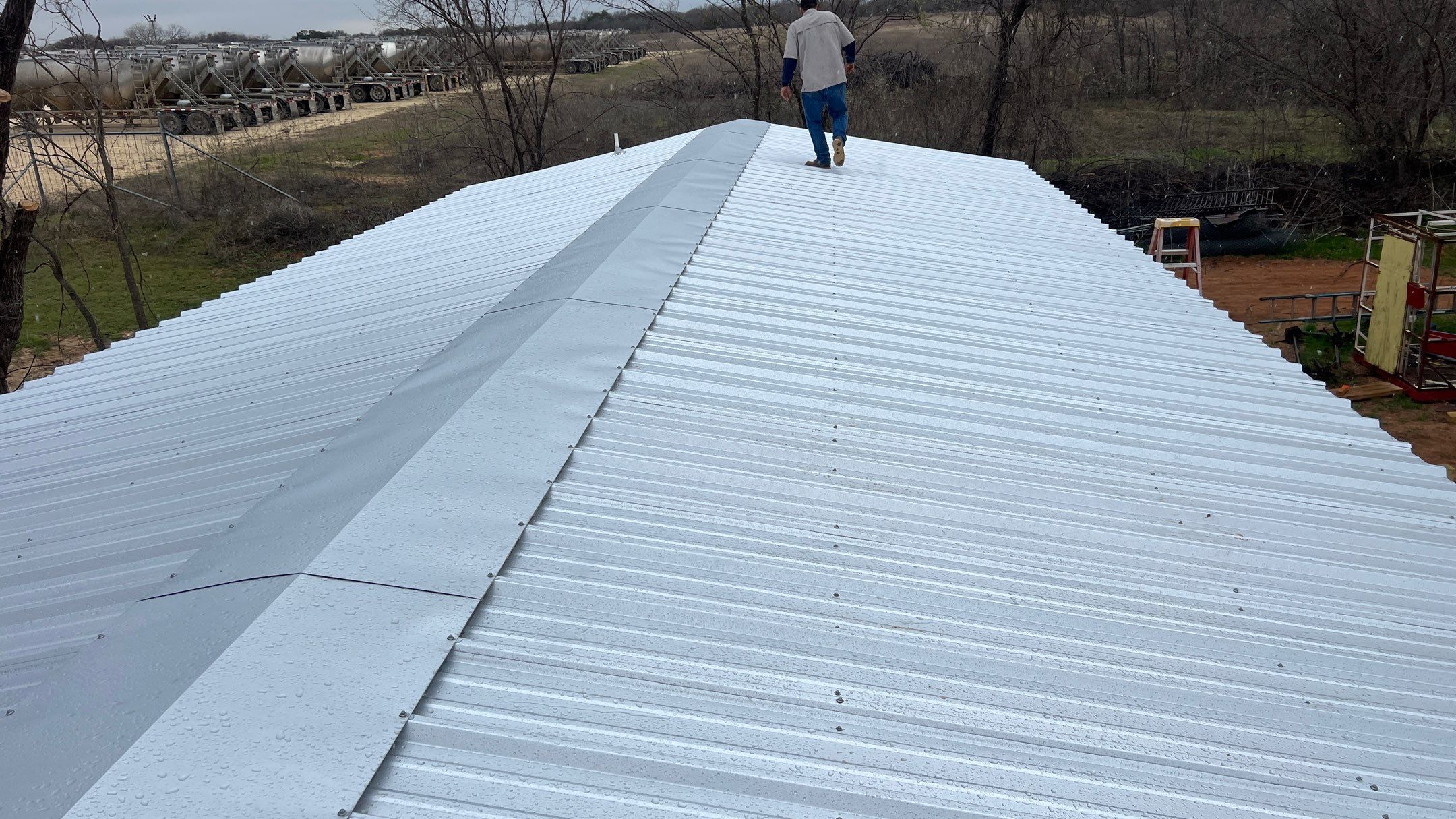 Residential Roofing Installation using PBR Metal Roof by Harvey Roofing & Construction