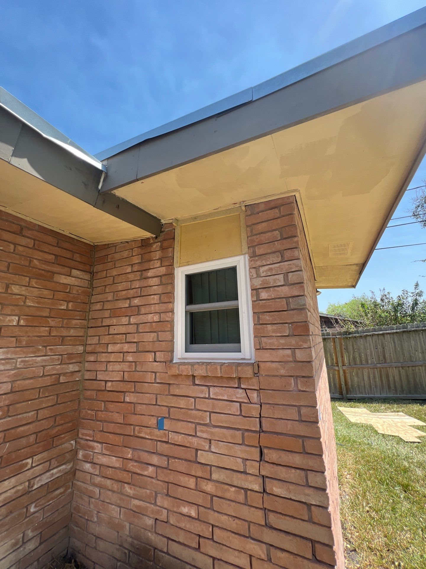 Windows in Brick with a Bay Window by Bayfront Roofing and Construction