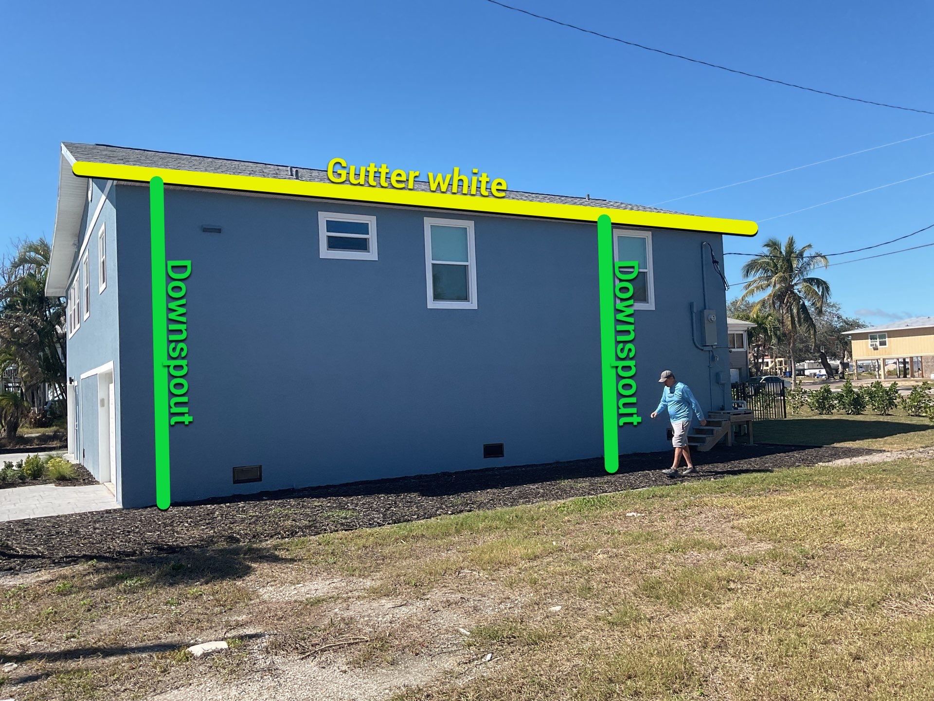Downspout Installation for Two-Story Home in Fort Myers FL by Gutter Professor by Gutter Professors