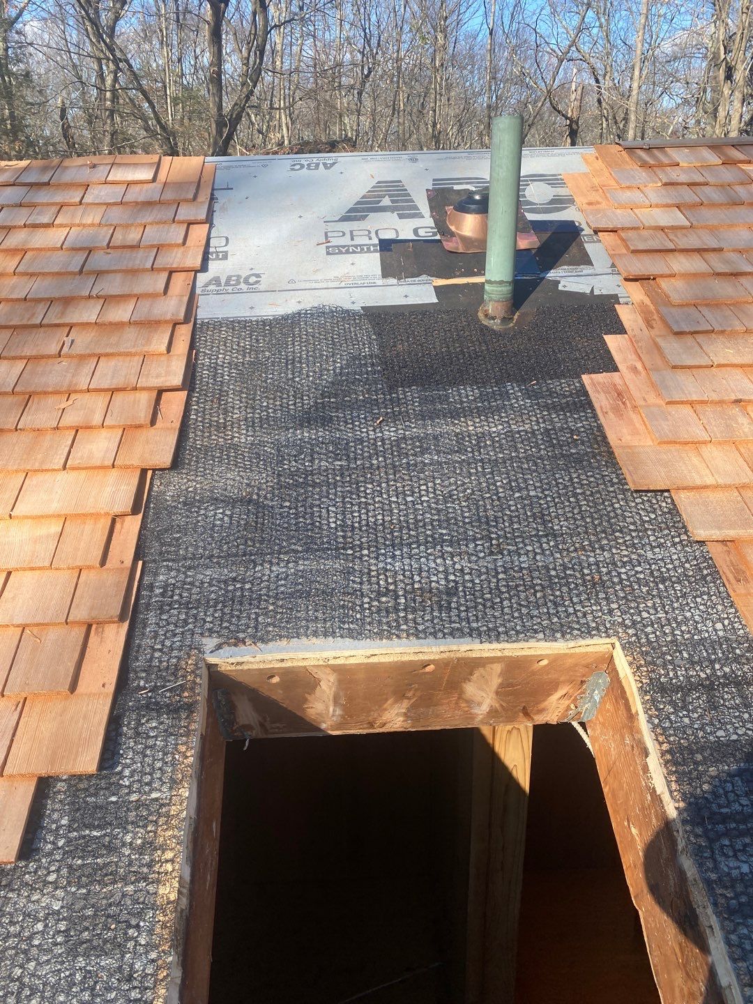 Residential Roofing Installation using Wood Shake by A Plus Exterior