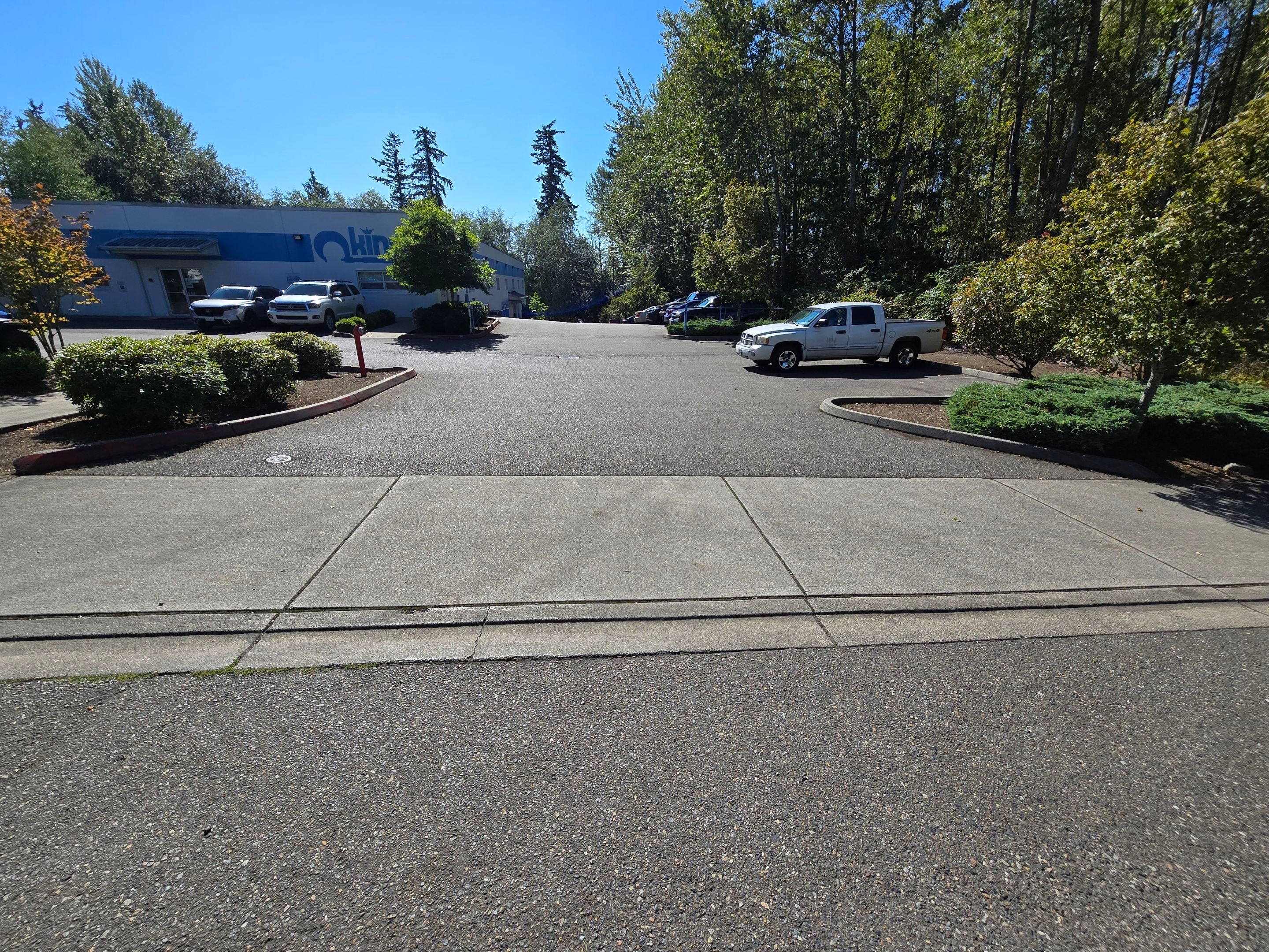King Machine Business Parking Lot Sealcoat Overlay | Mukilteo by Jireh Asphalt & Concrete Inc 