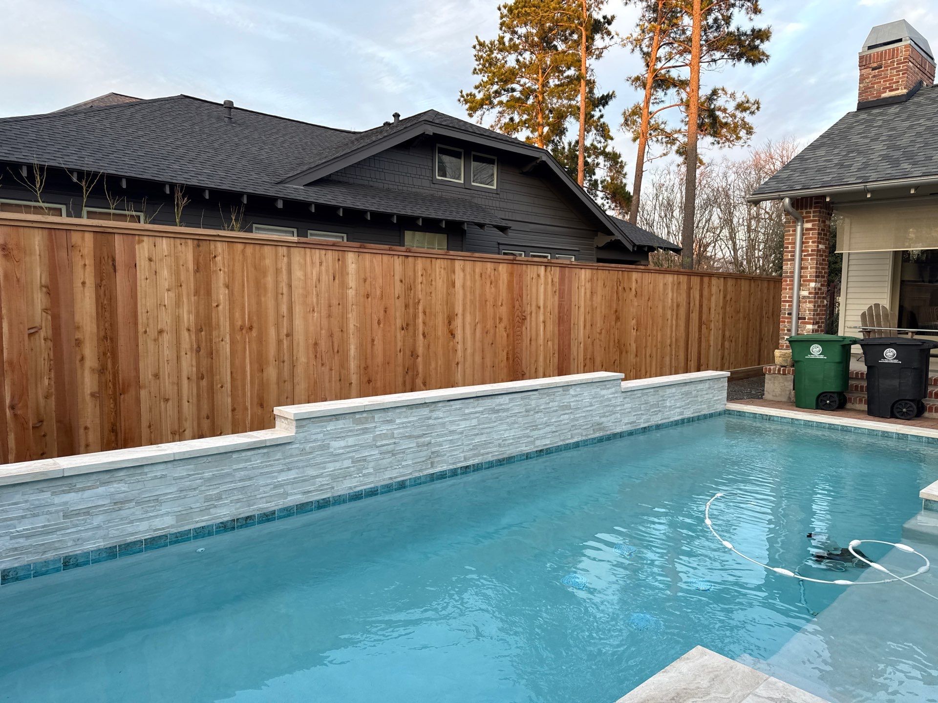 Durable Fence & Gate Installation with Premium Stain by Tim's Fences