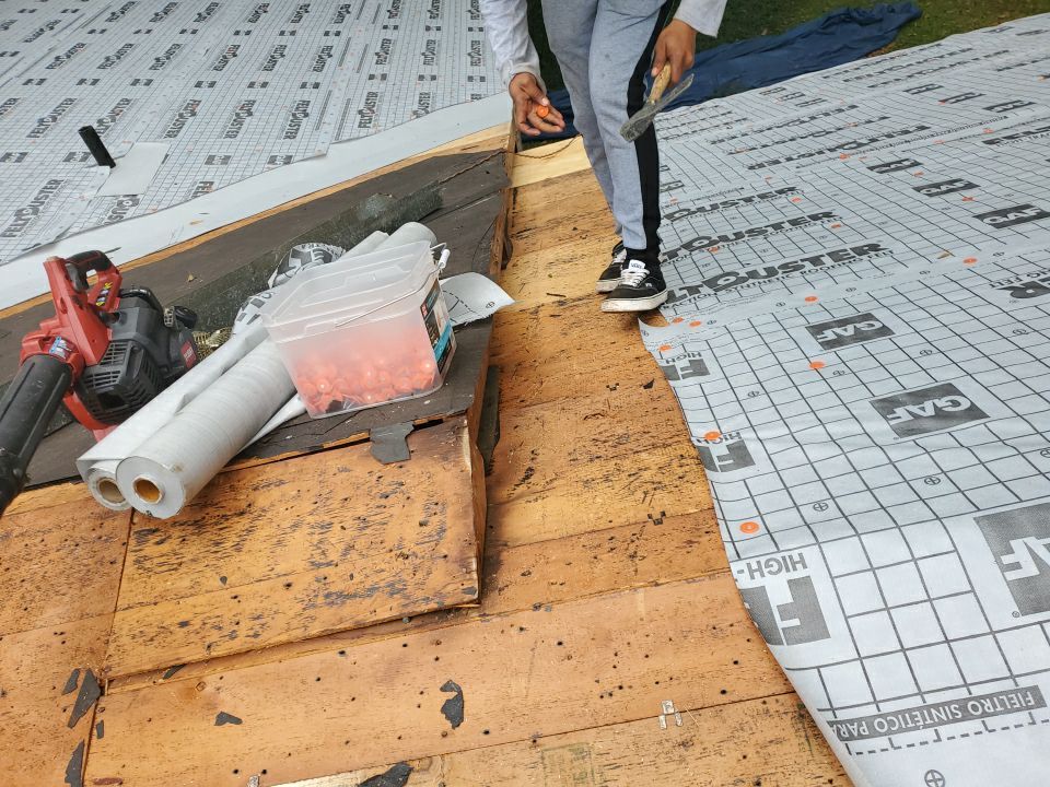 Residential Roofing Installation using Roof Replacement by American Roofing & Construction LLC