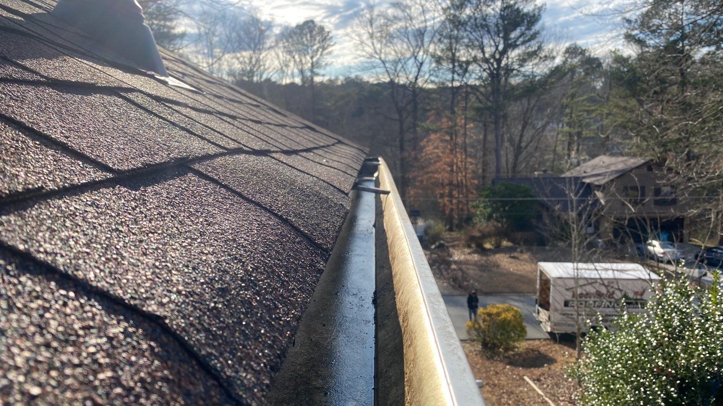 Cleaning Gutters  by Deerfield Roofing LLC