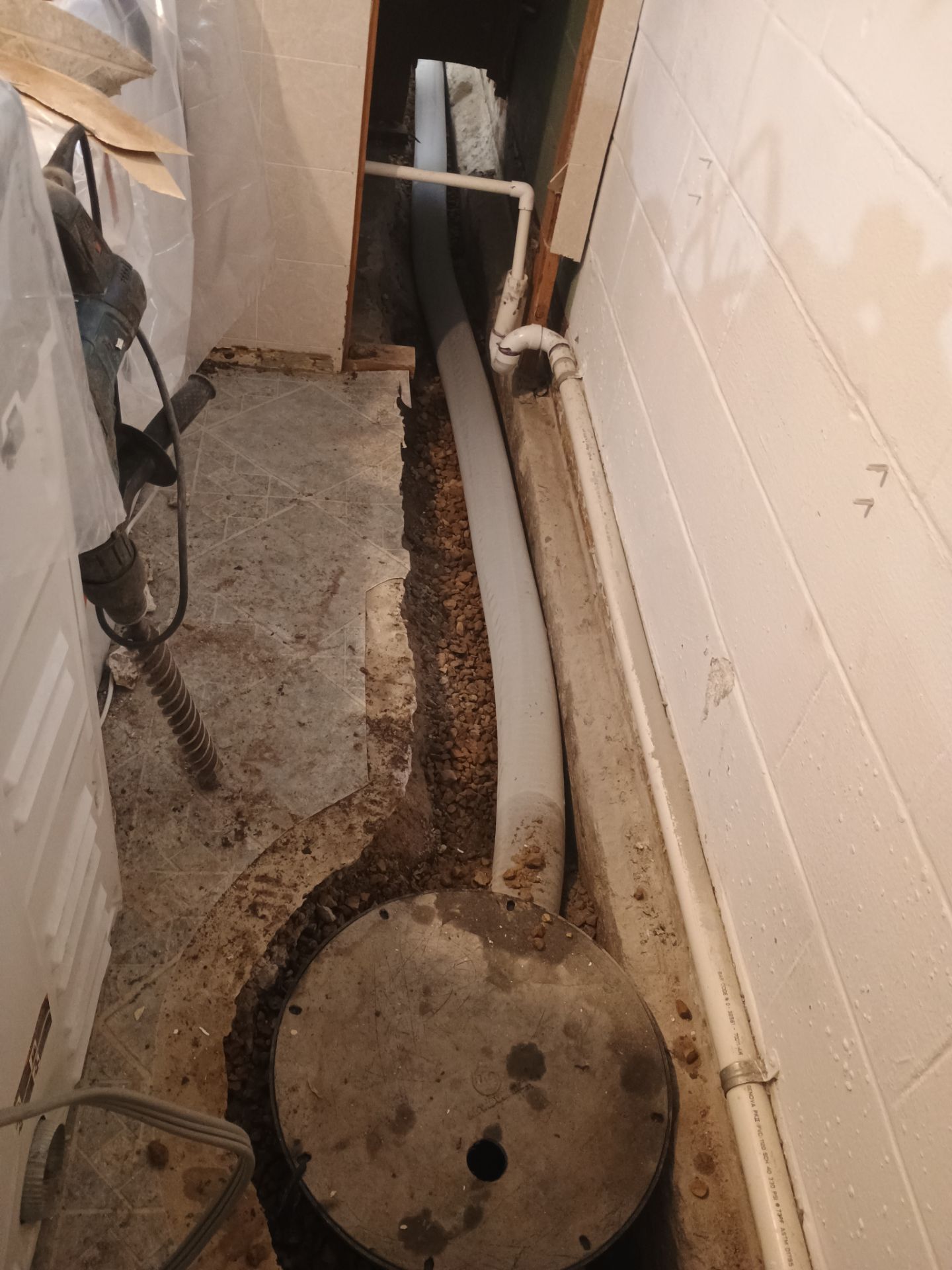 Drain Tile & a Sump Pump for our Property Management Partner by Waterproofing Northeast