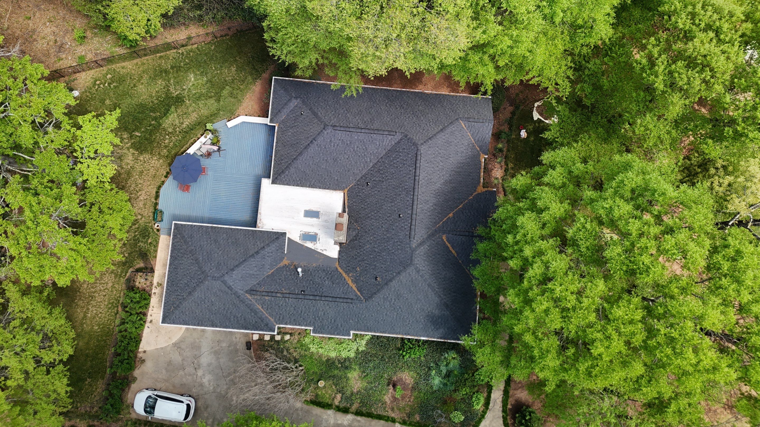 Spartanburg Residential Roof Replacement with Architectural Shingles and Skylights by Roofers LLC