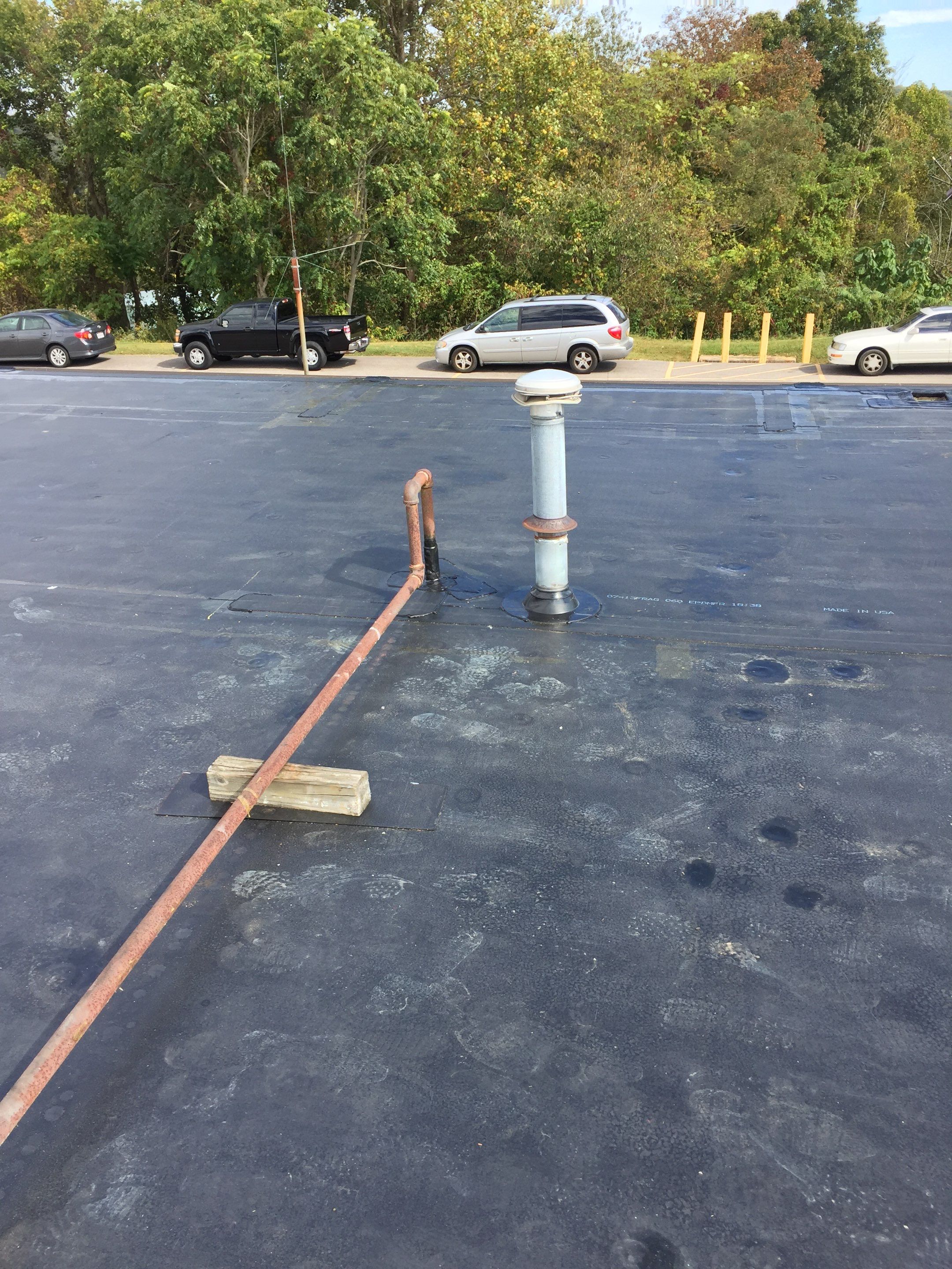 Commercial Rubber Roofing  using Carlisle Rubber Roofing System by Secure Construction Company Inc