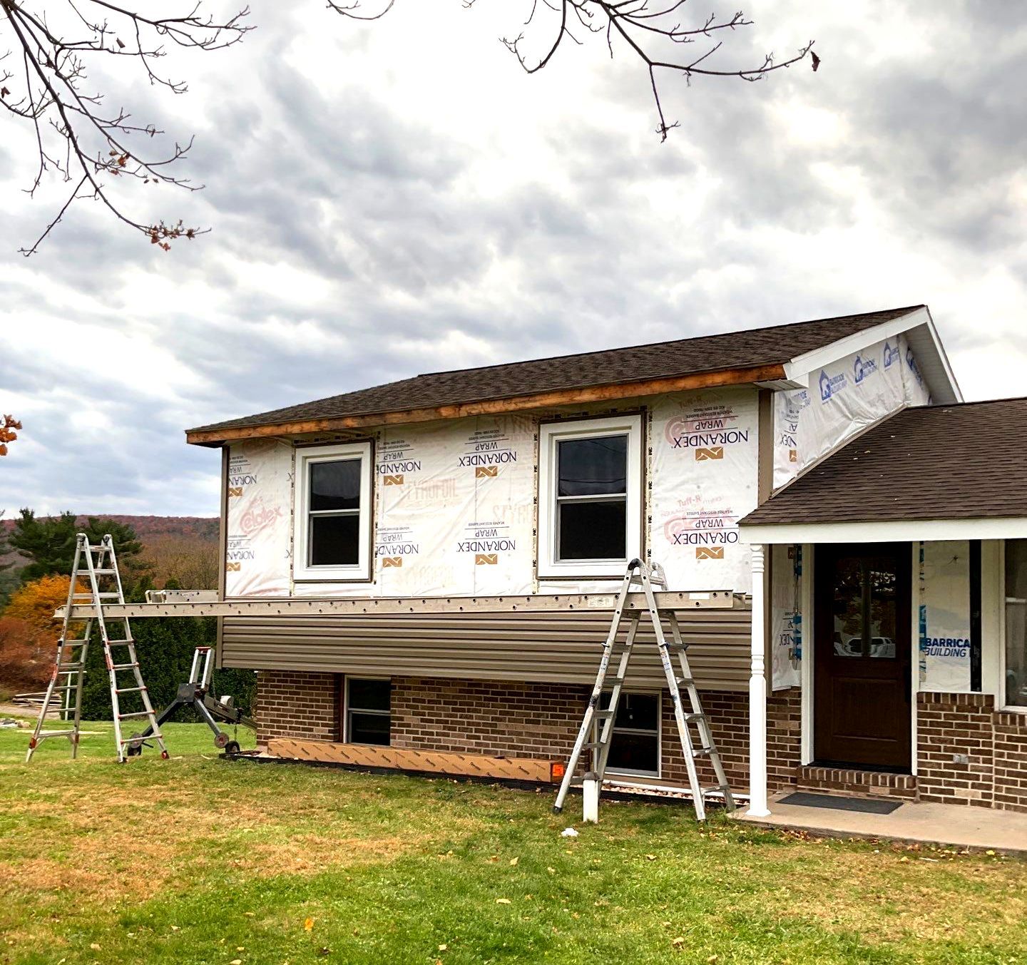 Exterior Siding Replacement With Window & Door Upgrades by Esh Builders