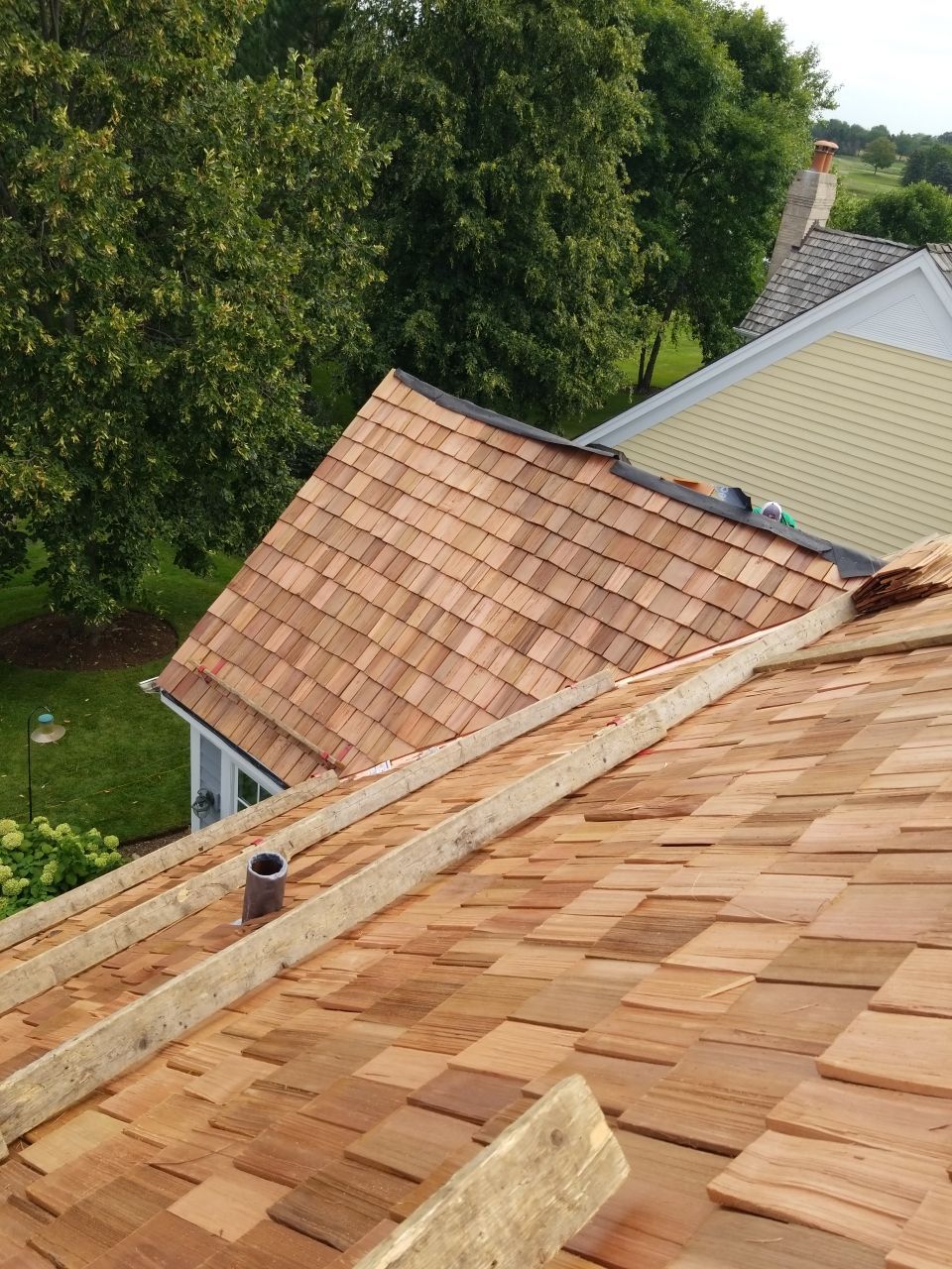 Cedar Roof Installation in Lake Forest by Custom Installations, Inc.