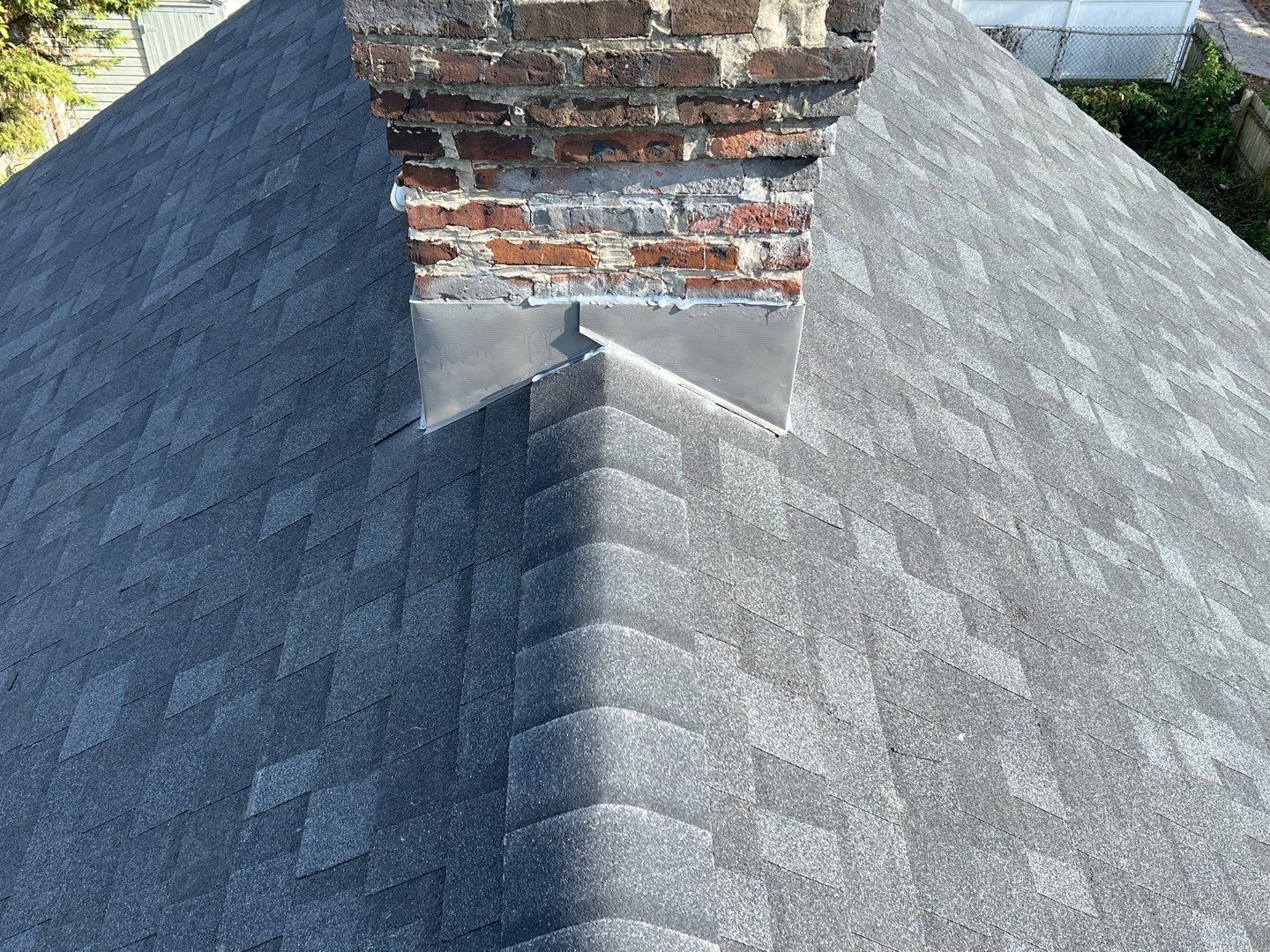 Onyx Black Shingles by Reimagine Roofing