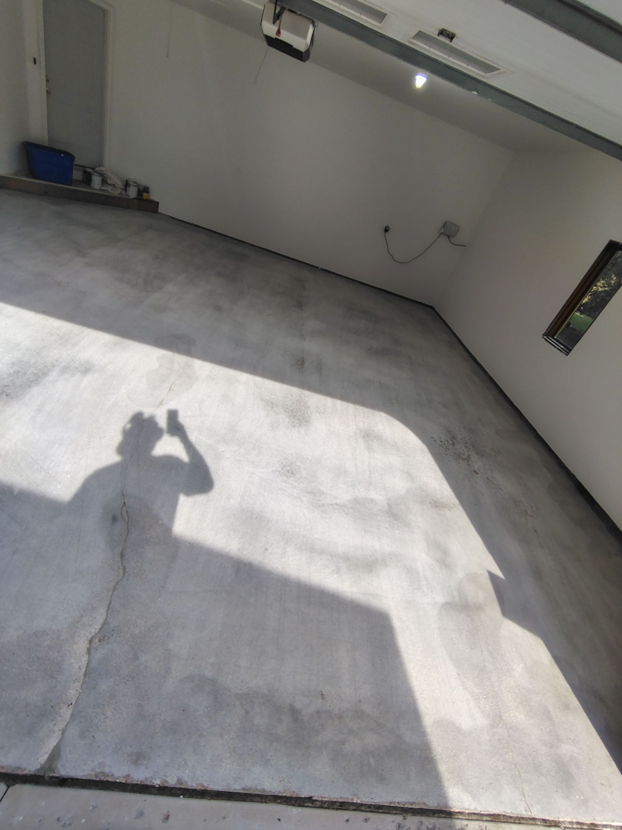 Sioux Falls Garage Floor Coating with Speckled Flake Finish by Select Painting, Coatings & Garage Cabinets