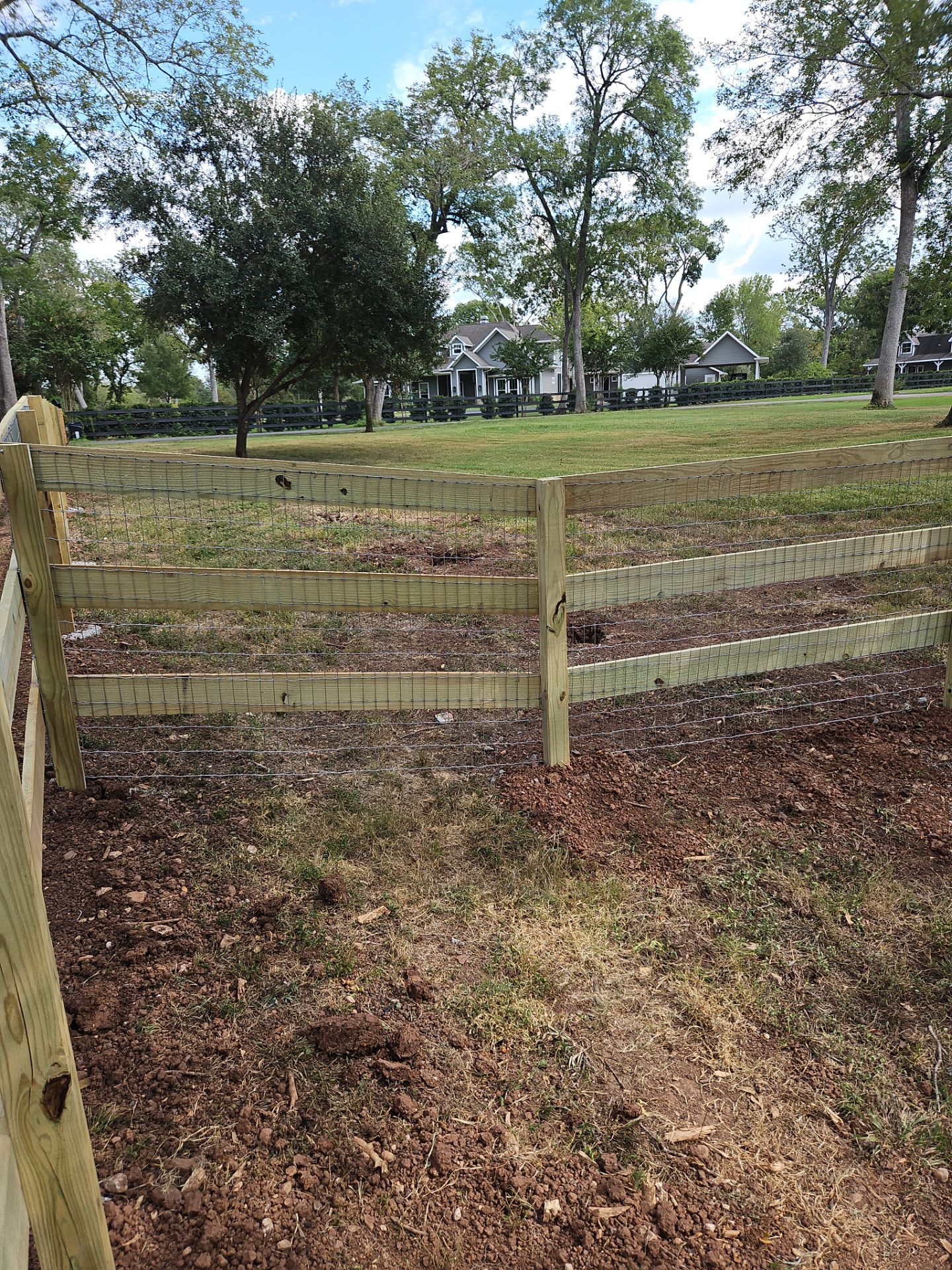 Ranch Style fence Plus Iron installation by Tim's Fences