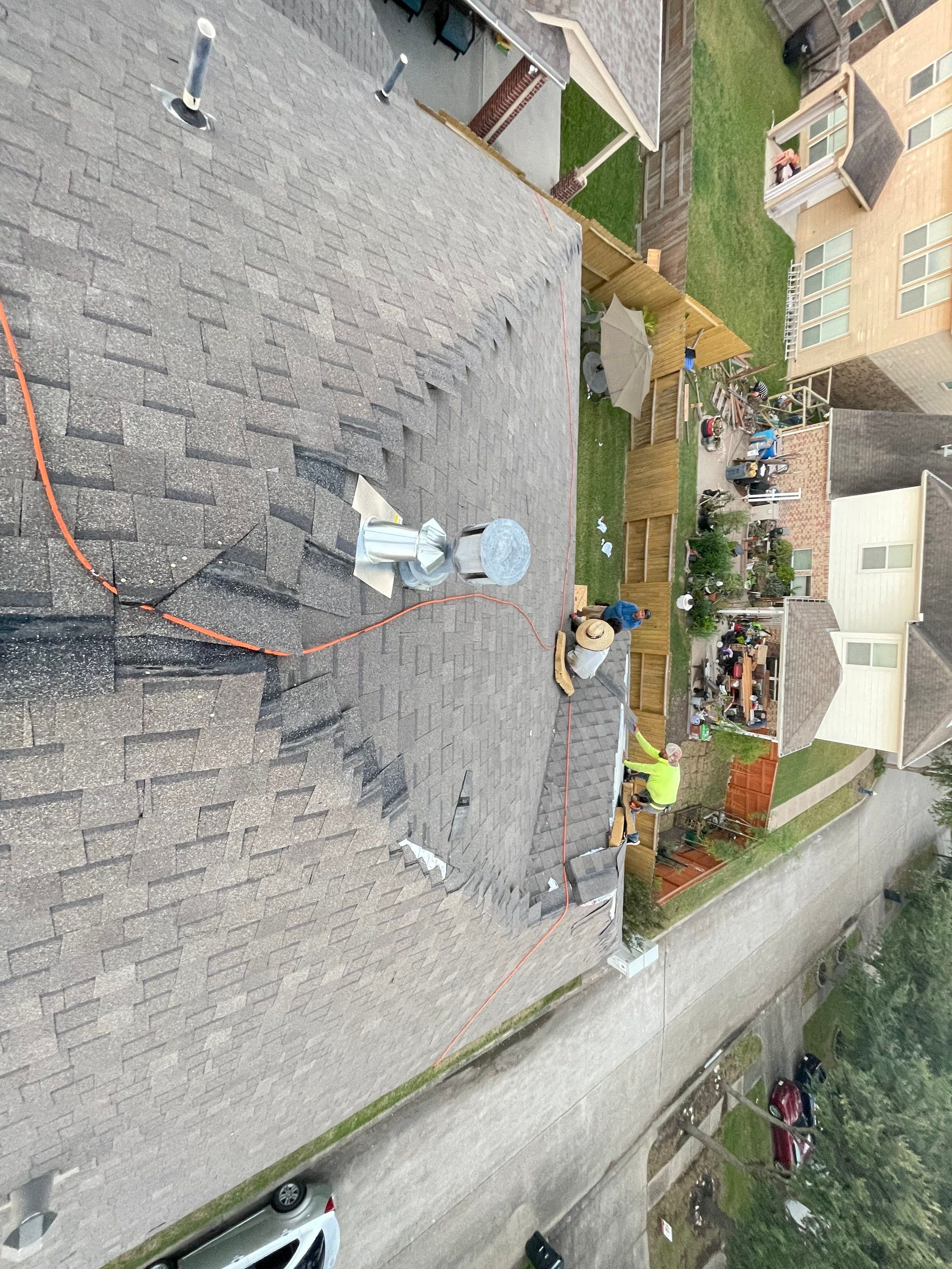Residential Roofing Installation using Atlas Pinnacle® Pristine Shingles Weatherwood Color by CAP Roofing and Construction LLC