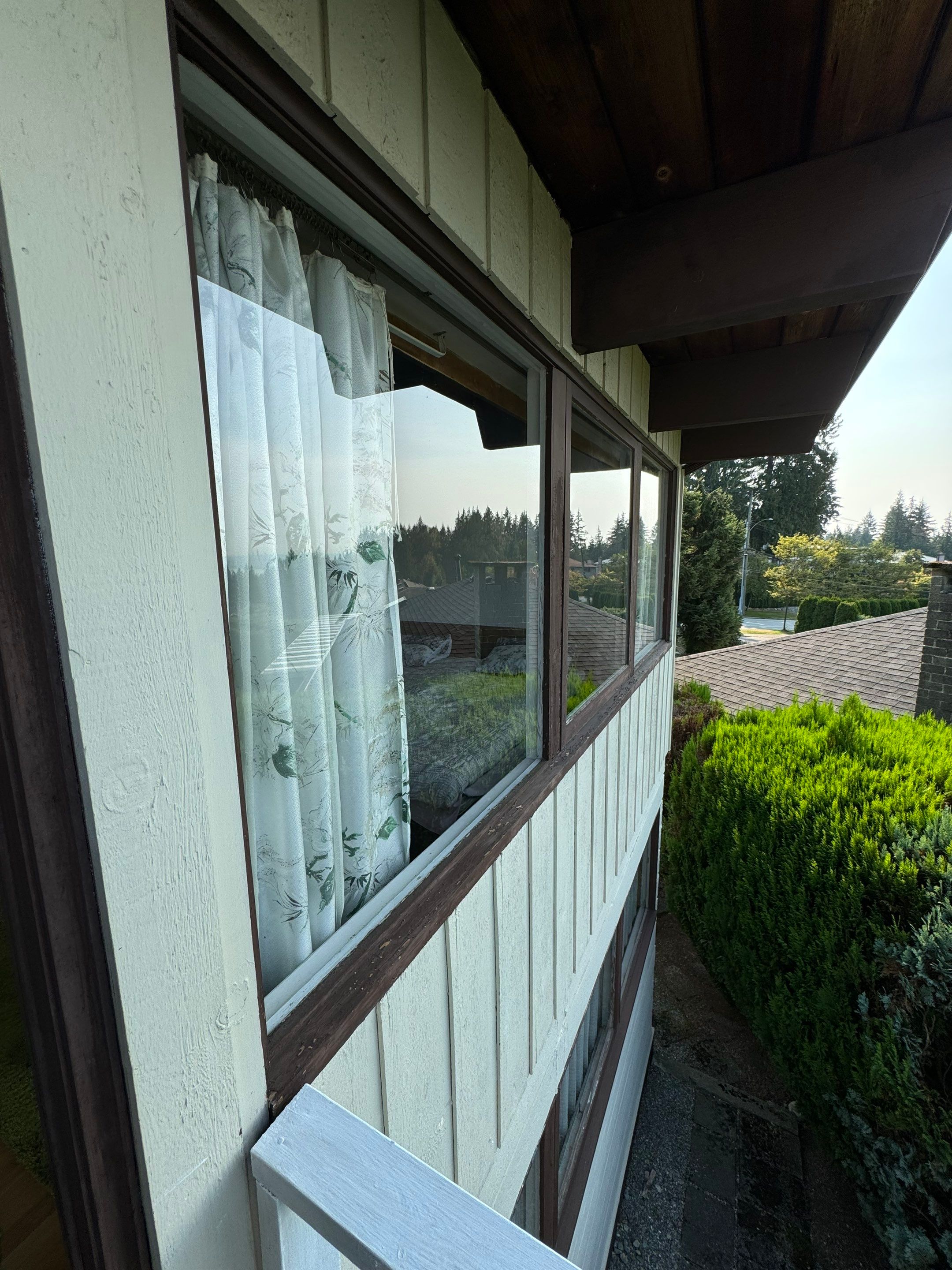 Exterior Window Trim Painting In North Vancouver  by YVR Construction Group