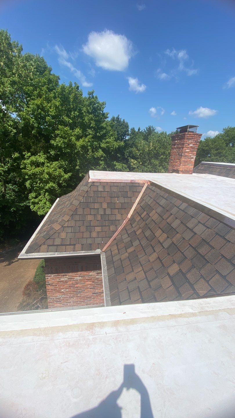 Residential Roofing Installation using Certainteed Belmont Shingles and TPO by Undersun Roofing 