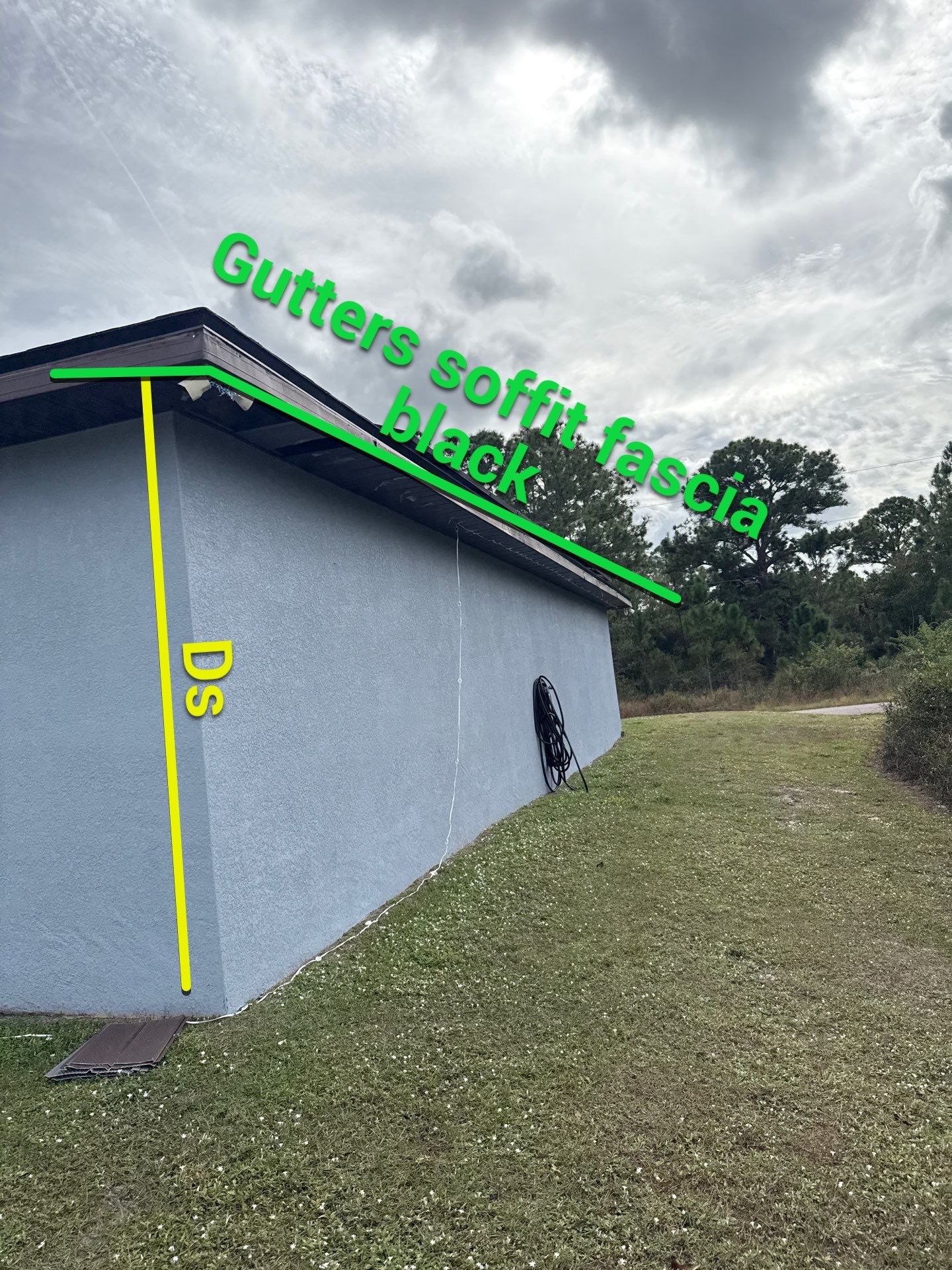 Black Seamless Gutters & Soffit/Fascia in Lehigh Acres FL by Gutter Professors