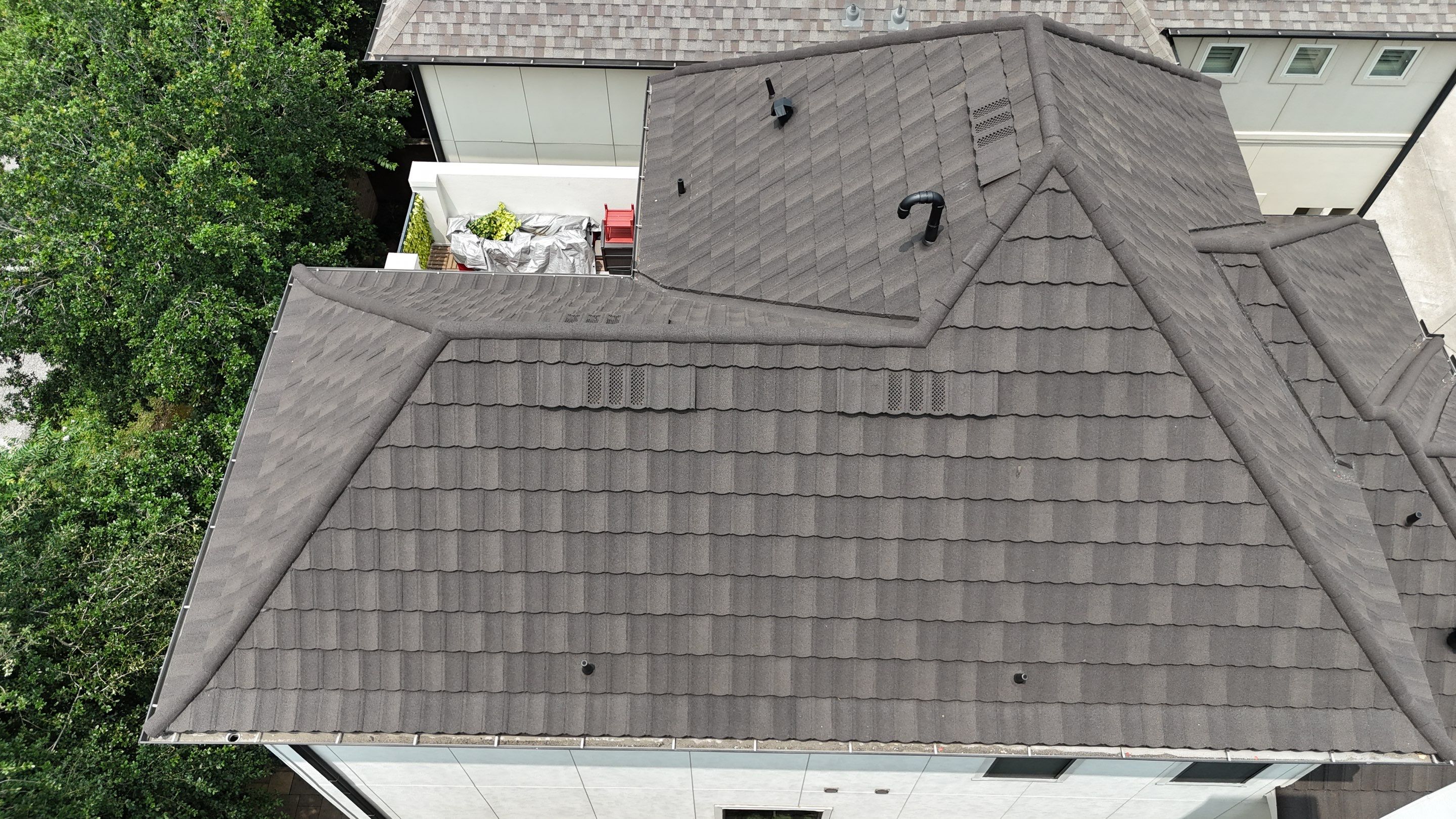 Stunning transformation from Shingles to DECRA Tile by Core Four Roofing