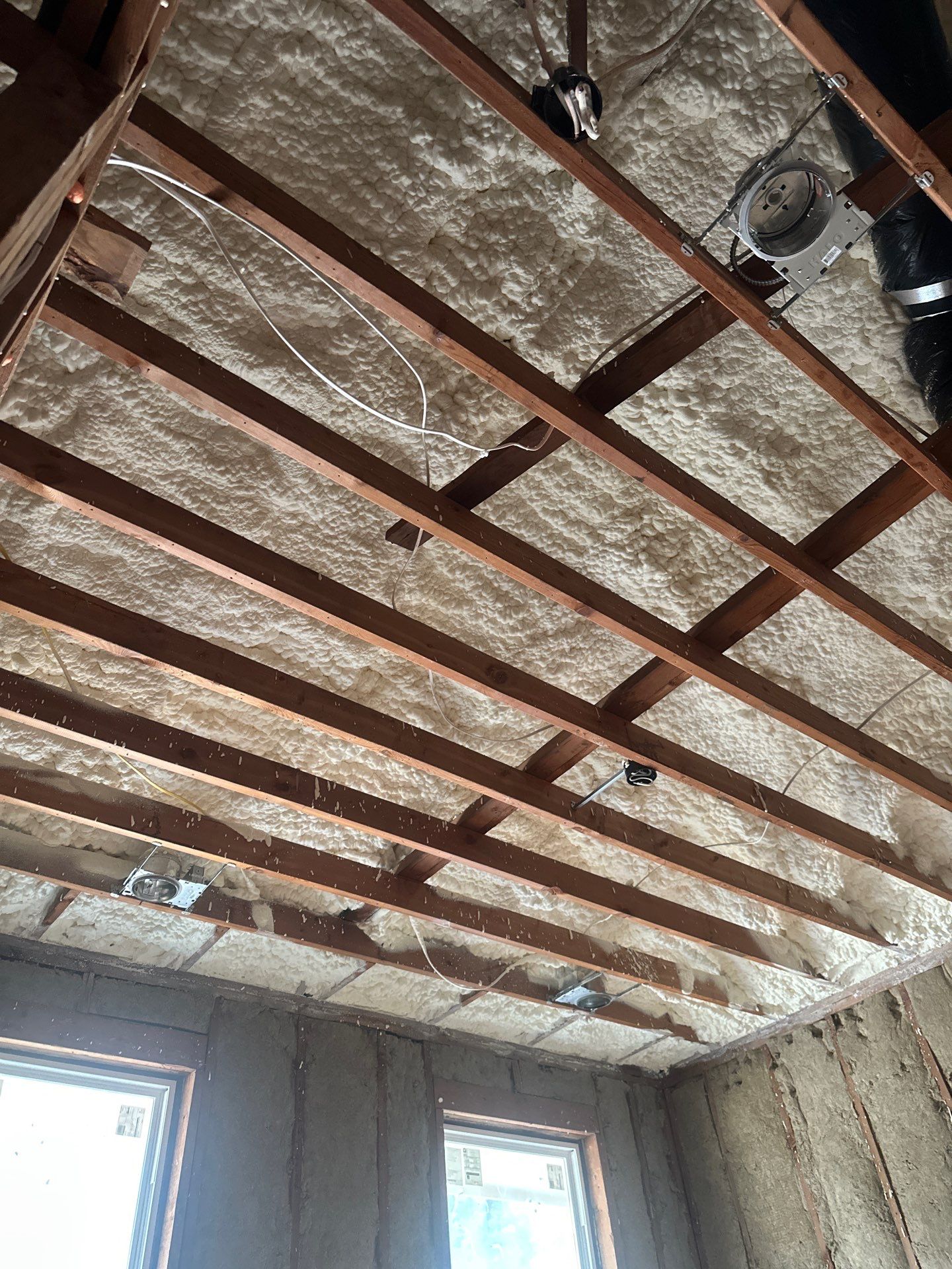 Open cell spray foam & rockwool job completed in Dallas TX by Apex Insulation Solutions