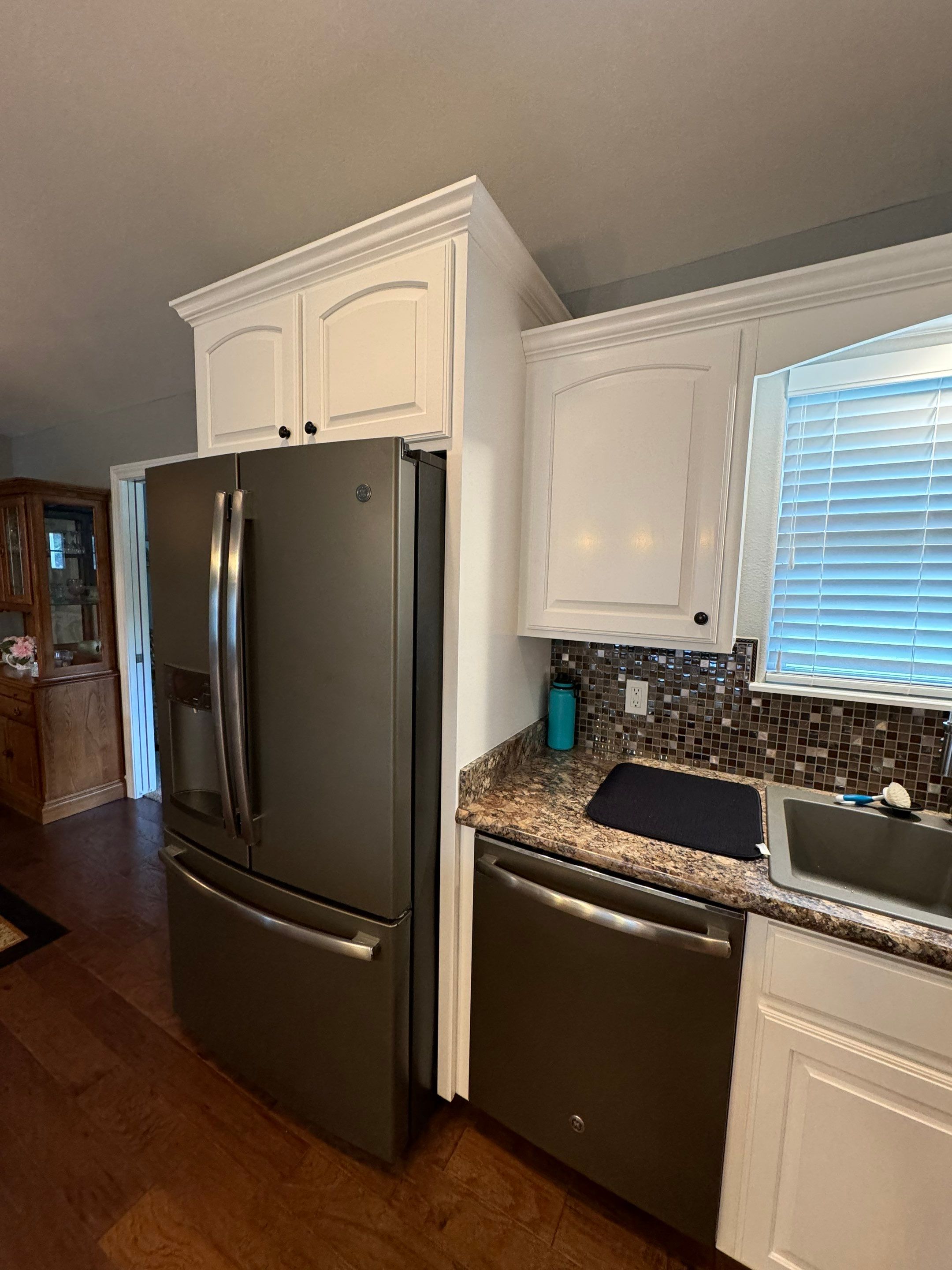 Cabinet Repaint off S Country Club by Pezley Painting