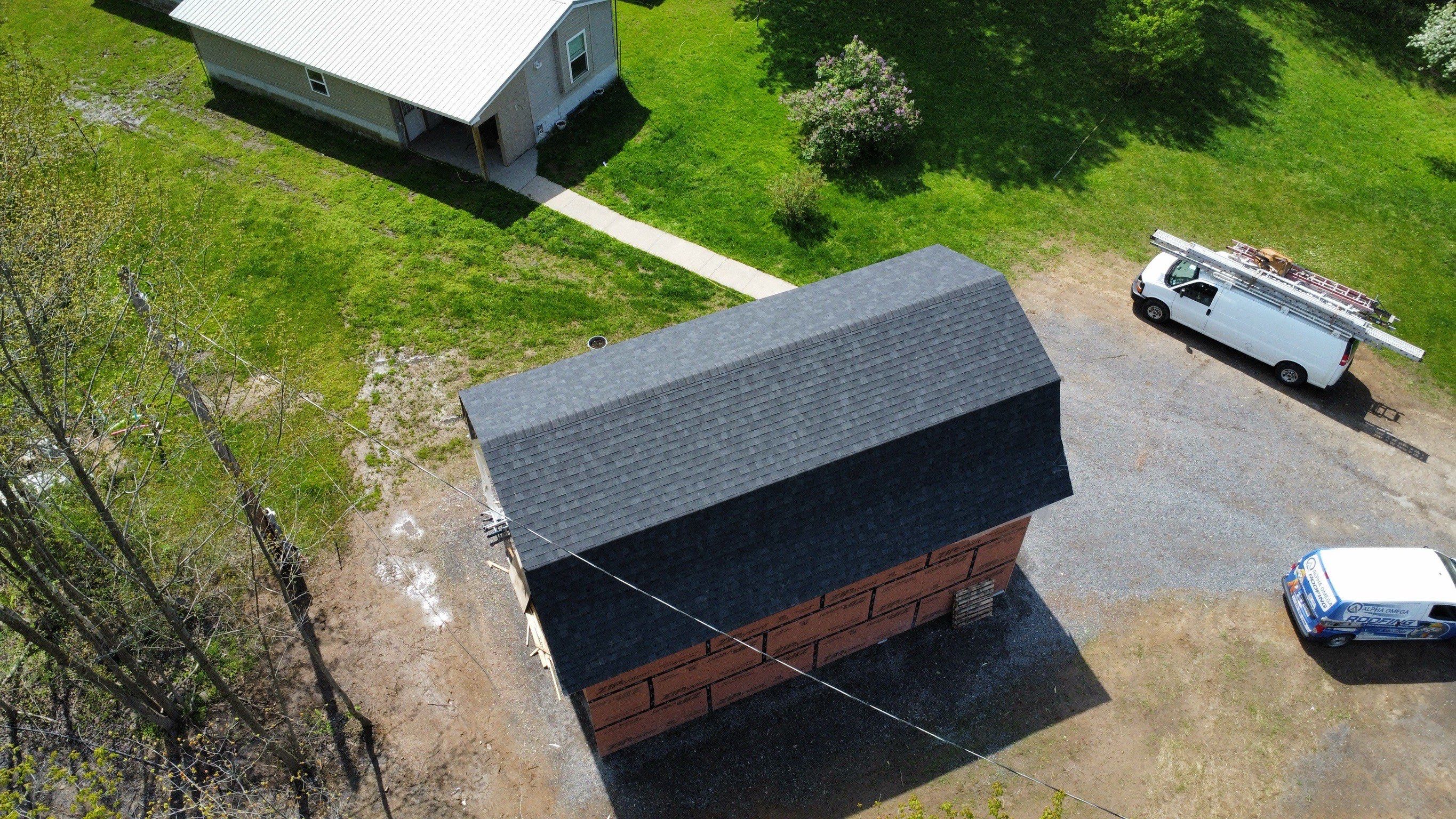 🏠 New Shed Installed in Parish, NY 🛠️ by Alpha Omega Roofing LLC