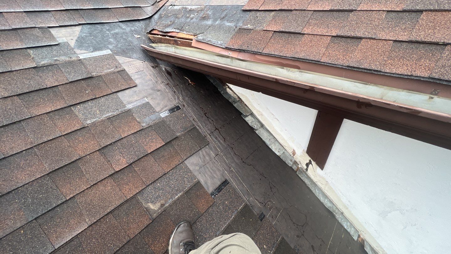Step flashing repair on roof to wall by Pro Home Services Inc