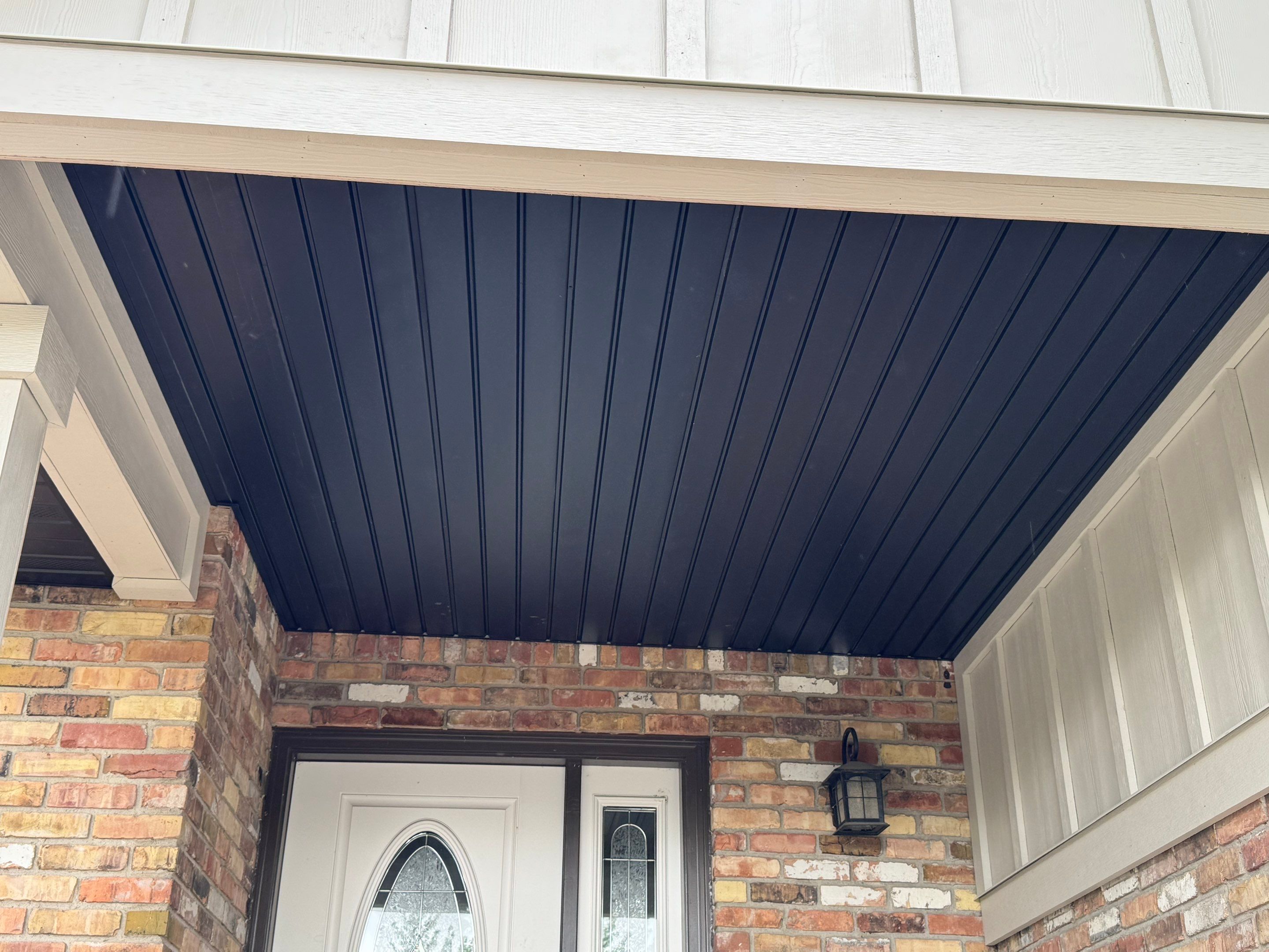 Cottonwood Heights | Custom Hardie Exterior & Bold Fascia | Cobble Stone Accents by Ideal Siding Utah