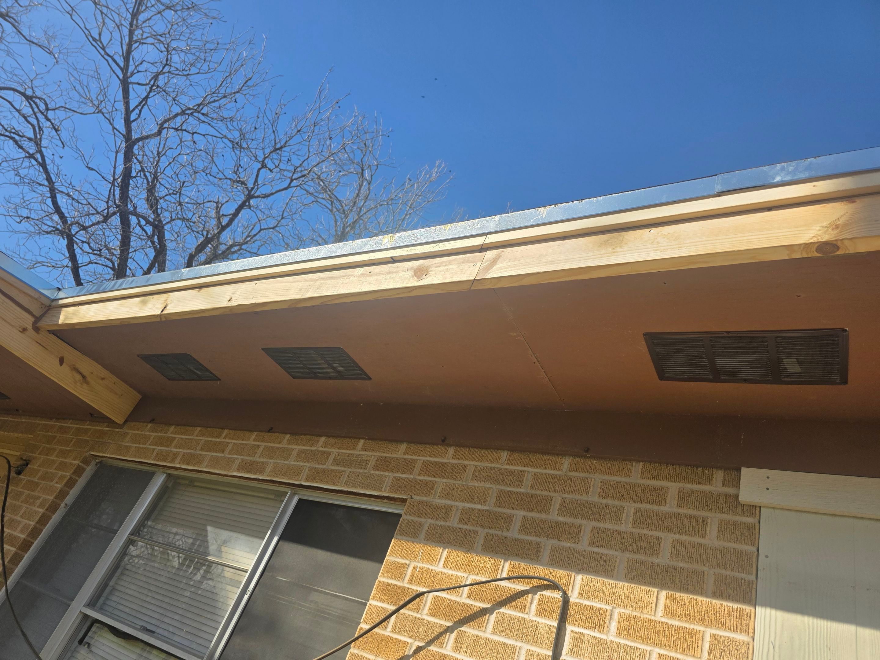 Torch down modified bitumen roof and full fascia "face-lift" in Elgin, TX by REPS Austin Area Roofer