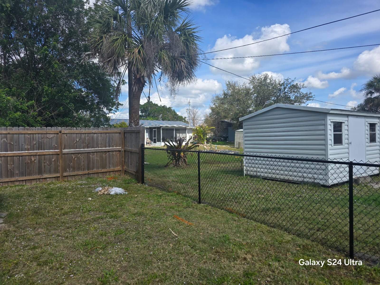 Black Chain Link Fence Installation for Port Charlotte Residence by True Fence LLC