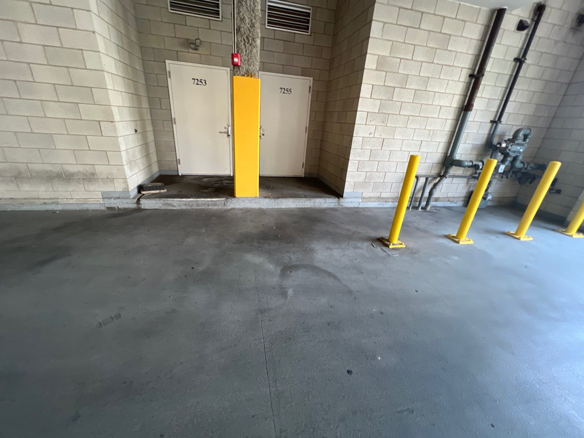Parking garage using Hot water by Northern Power Washing LLC.