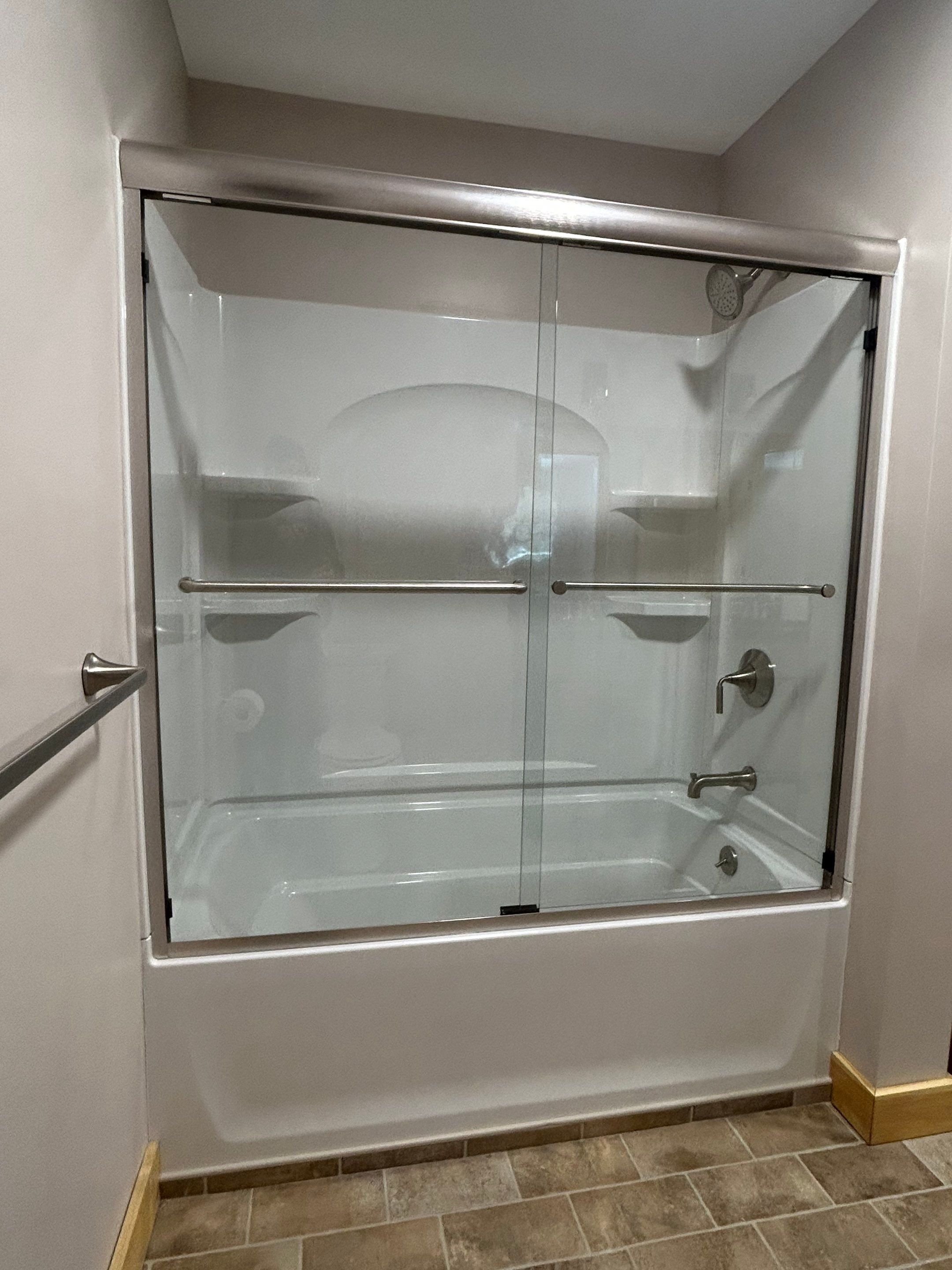 Two Showers using Alumax Shower by Cheshire Glass Company