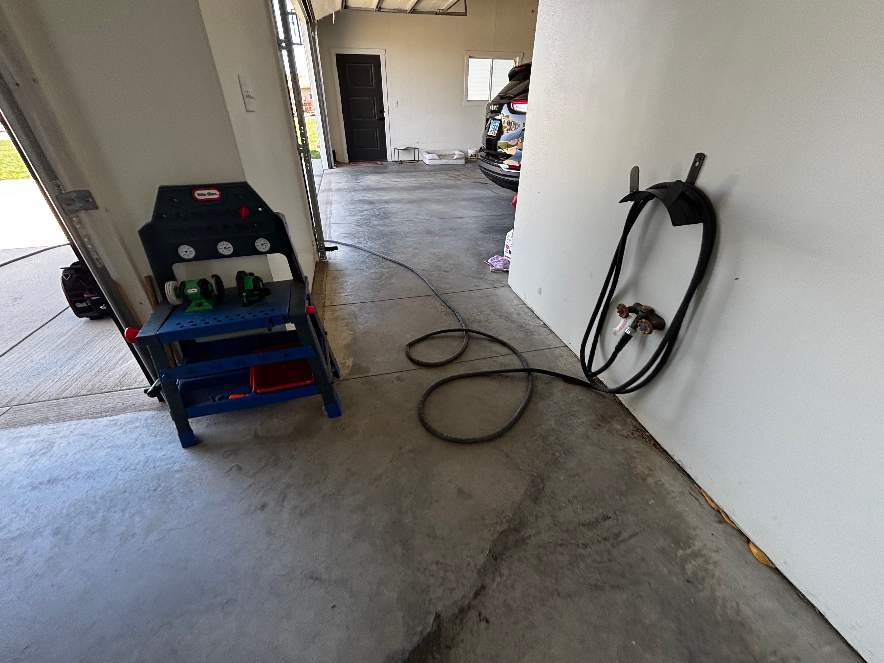 Dell Rapids Multi-Car Garage Concrete Floor Coating and Repair by Select Painting, Coatings & Garage Cabinets