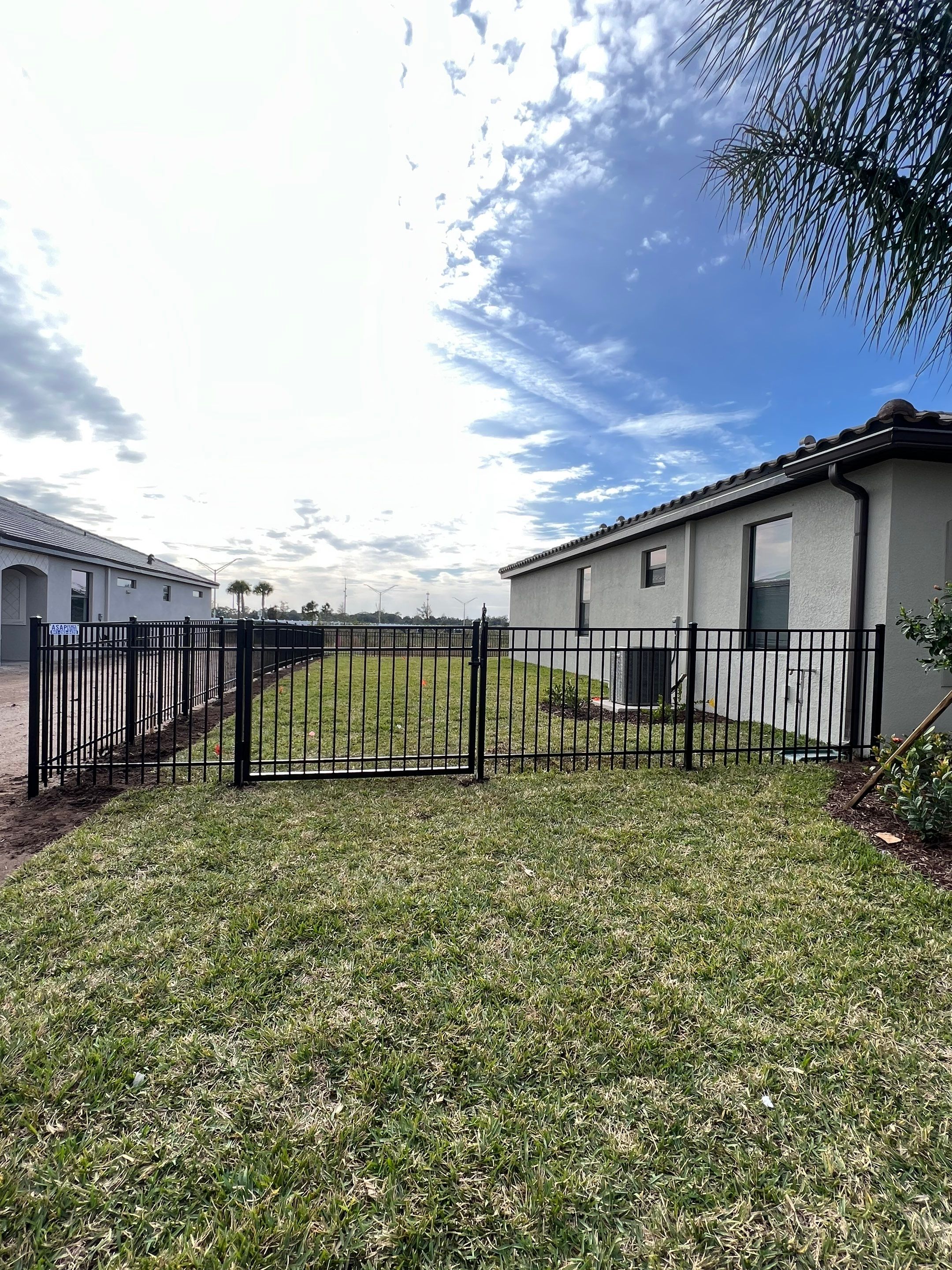Aluminum Fence Installation using Black 3 Rail Aluminum Fence by Asap fence and gates, LLC