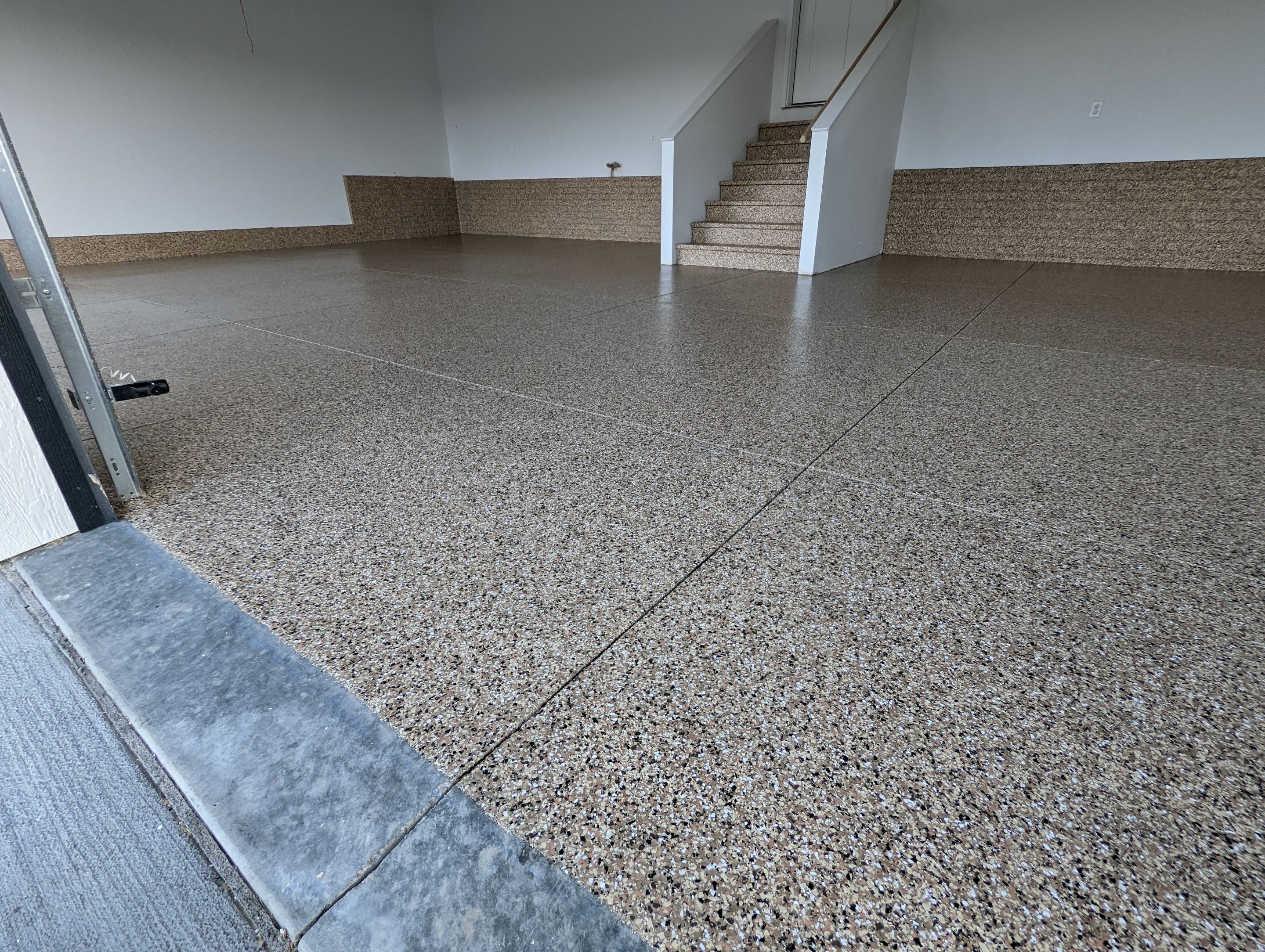 Garage using Sandstone by Select Painting, Coatings & Garage Cabinets