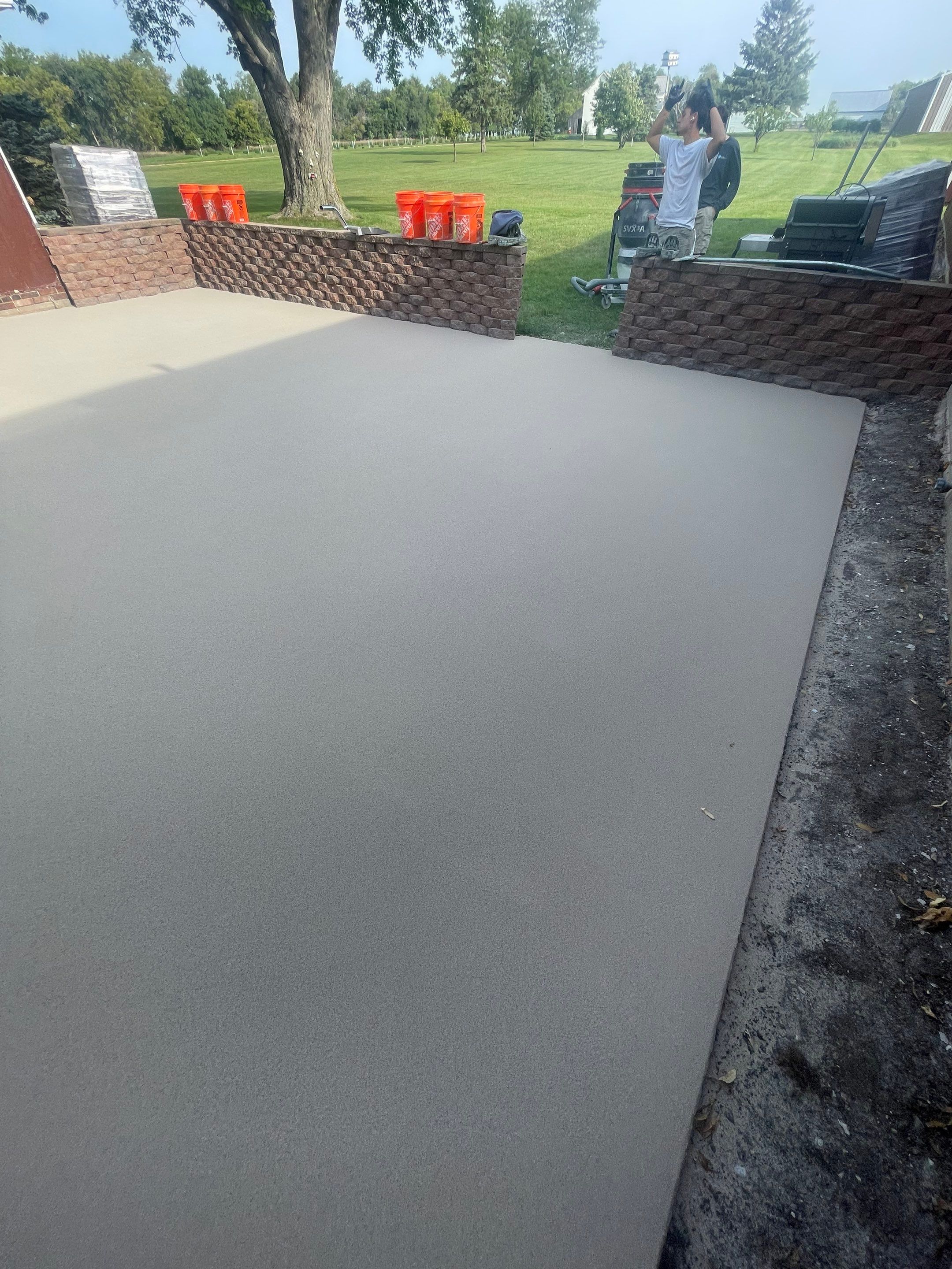 Concrete Patio Resurfacing and Protective Coating in Winfred, South Dakota by Select Painting, Coatings & Garage Cabinets