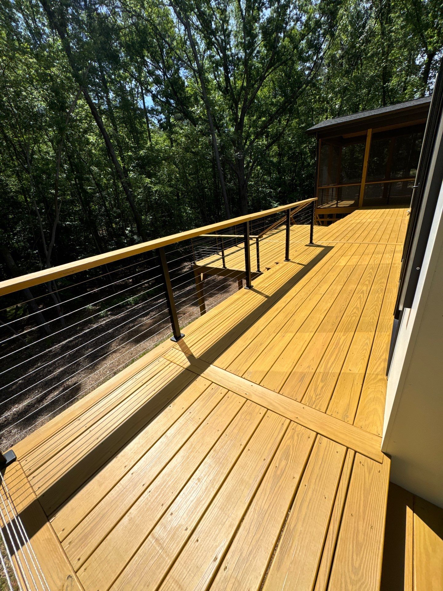 Porch and Deck staining  by GonzalezPainters & Contractors Inc 