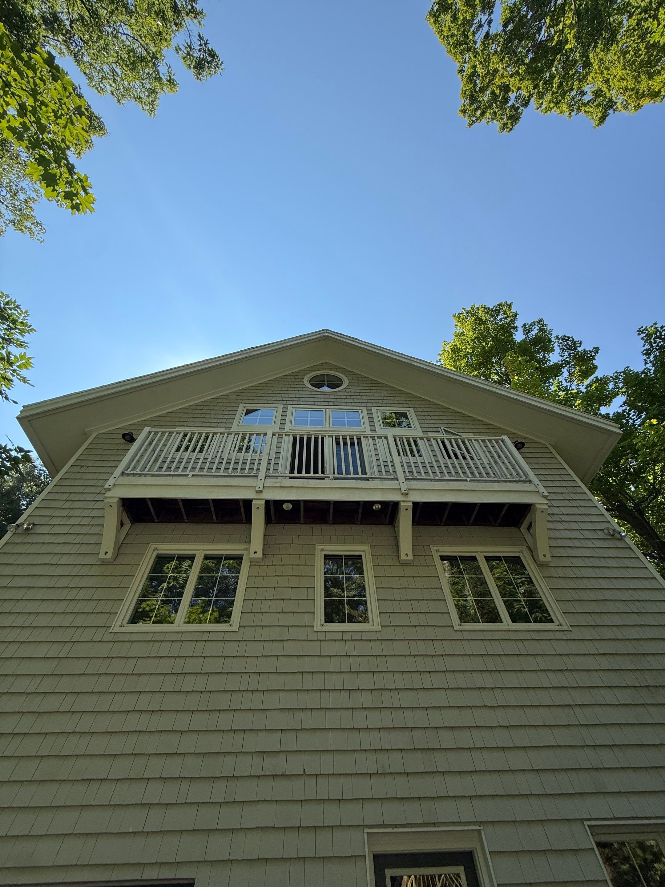 Lakefront Deck Pressure Washing, Exterior Wood Staining, and Painting in West Olive MI by Gordon Painting