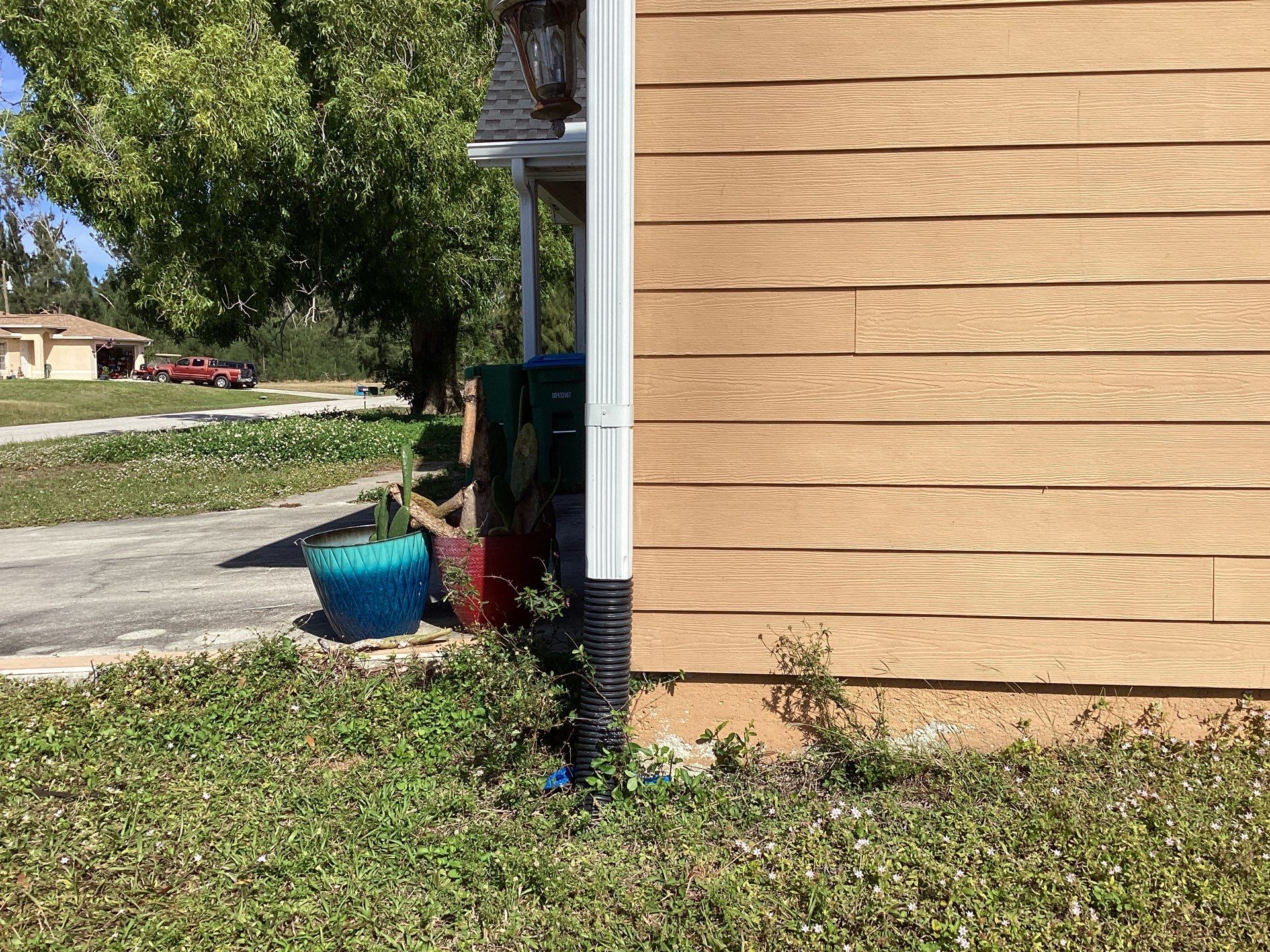 Soffit & Fascia White + New Downspouts by Gutter Professors