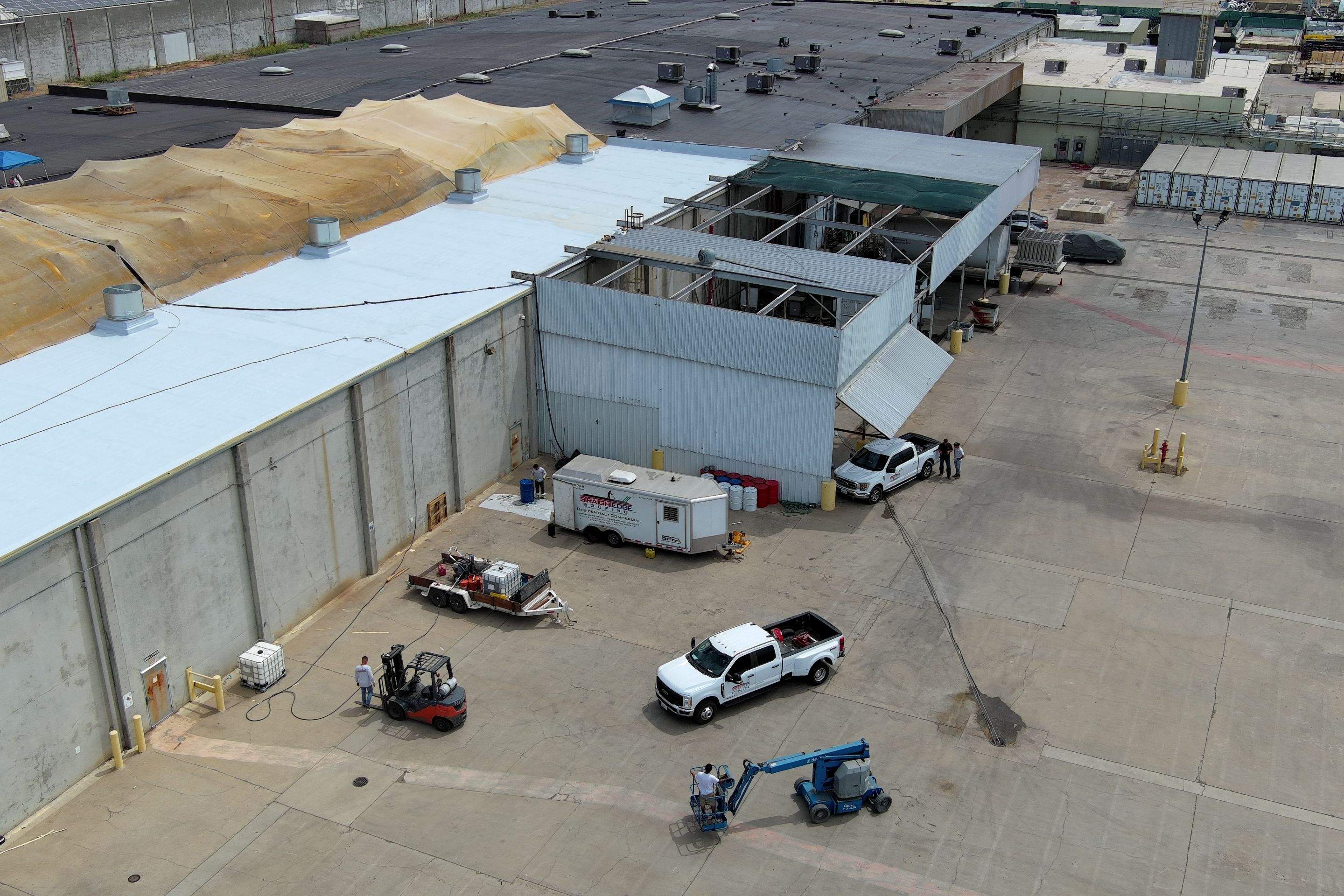 Pro Farms Spray foam roofing project by Straight Edge Roofing Inc