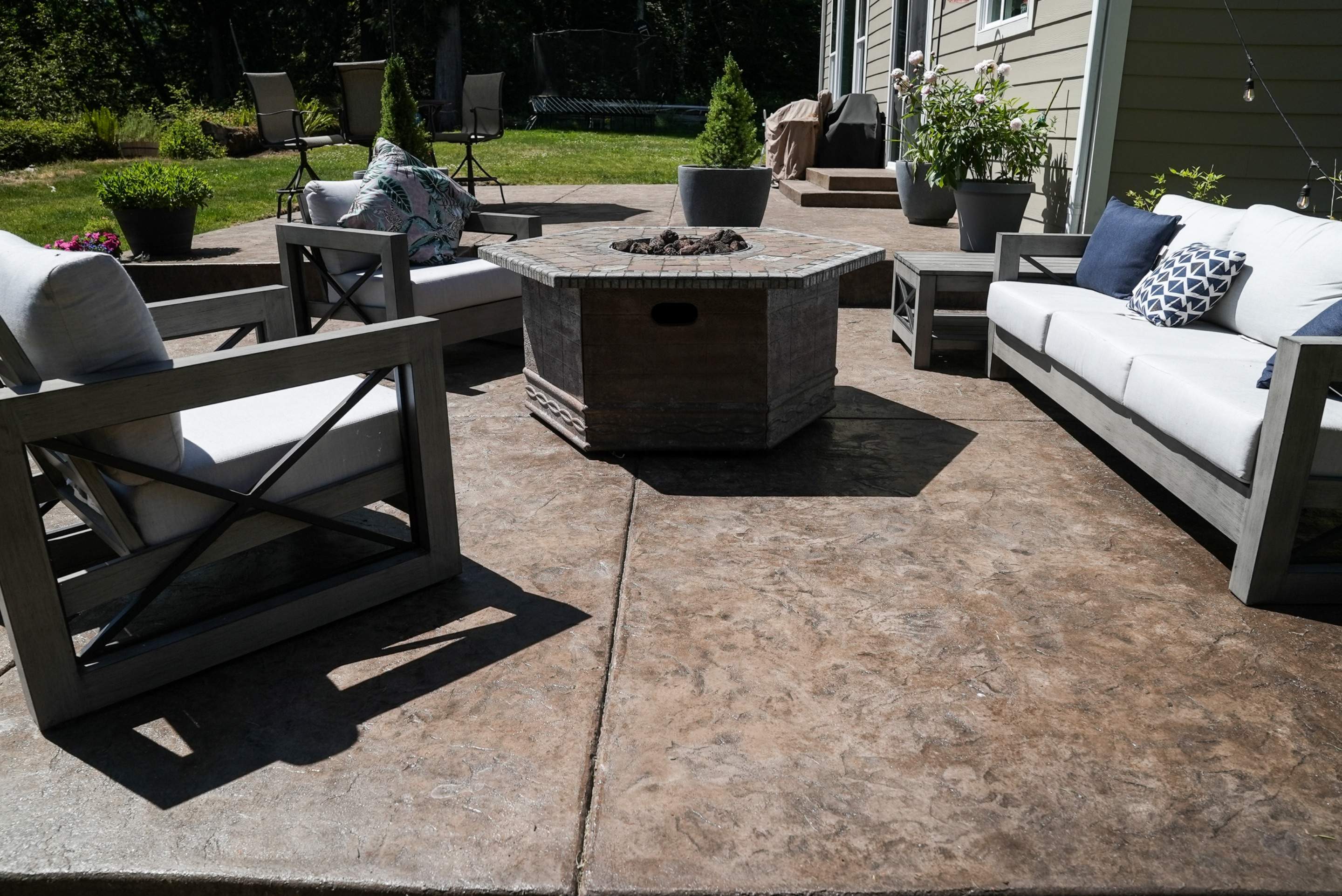 Mandy | Stamped Concrete Patio & Driveway by Jireh Asphalt & Concrete Inc 